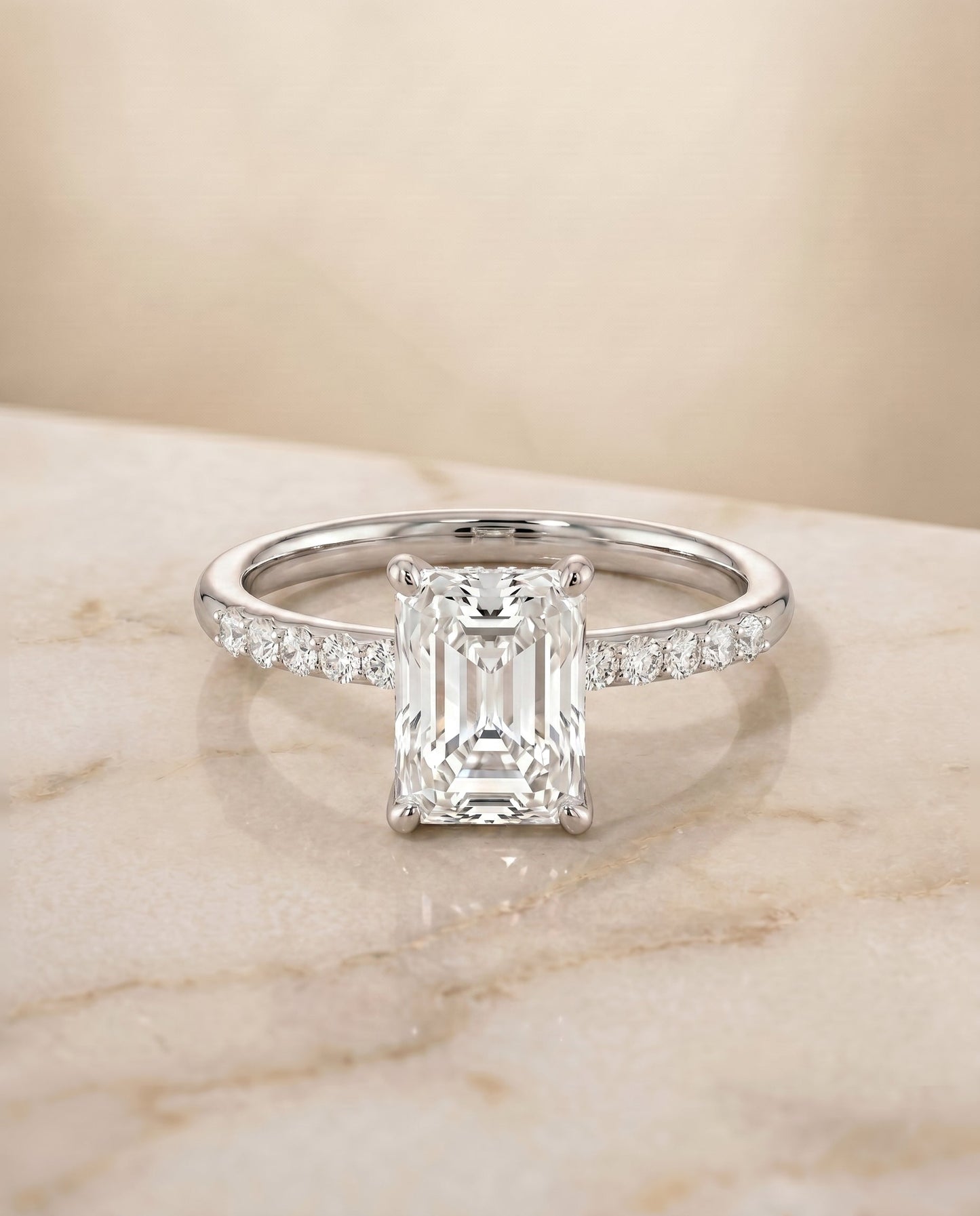 Cherie Select Hidden Halo Pavé Solitaire Radiant Cut Lab Diamond Engagement Ring in Platinum, shown on hand, angled | RockHer