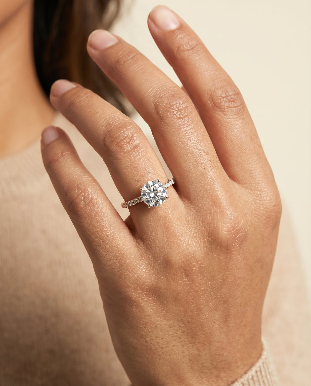 Cherie Select Hidden Halo Pavé Solitaire Round Lab Diamond Engagement Ring in 14K Rose Gold, shown on hand | RockHer