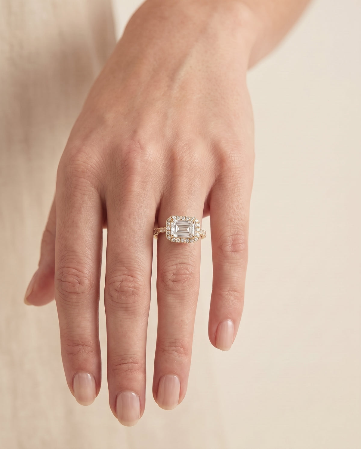 Emerald engagement ring setting in 18K Yellow Gold, Christina East West Horizontal Halo Emerald Cut, alternate view | RockHer