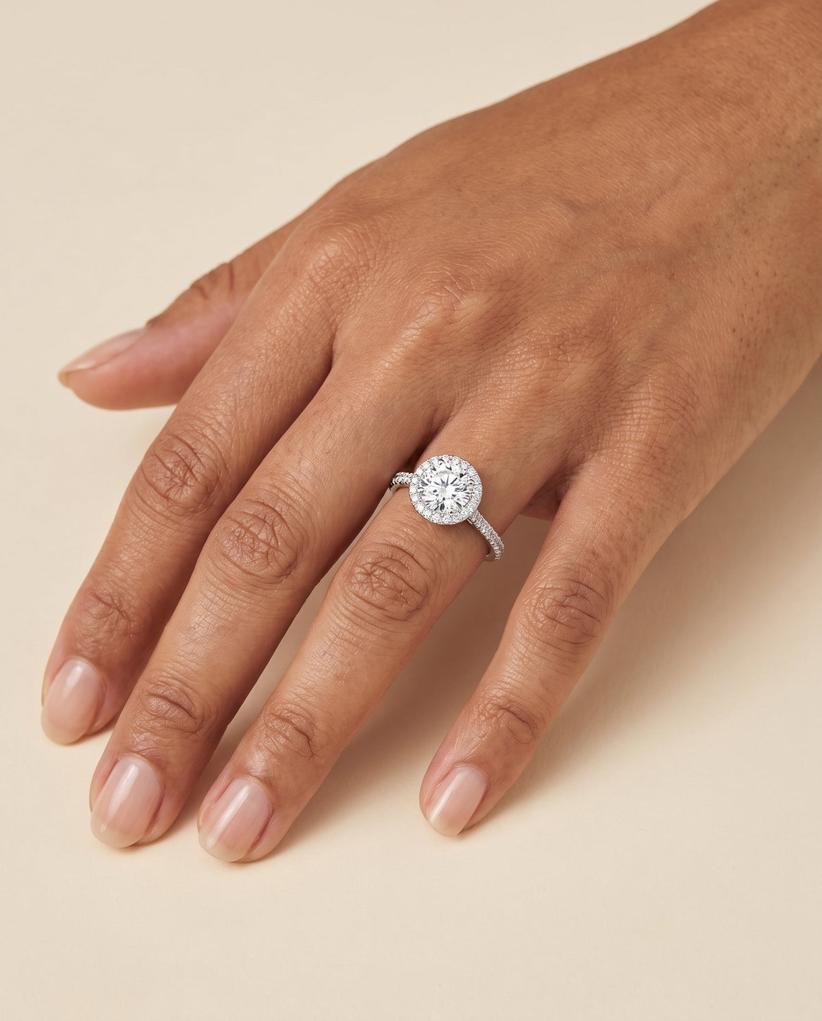 The Christina East West Horizontal Halo Round Engagement Ring Setting in Platinum
