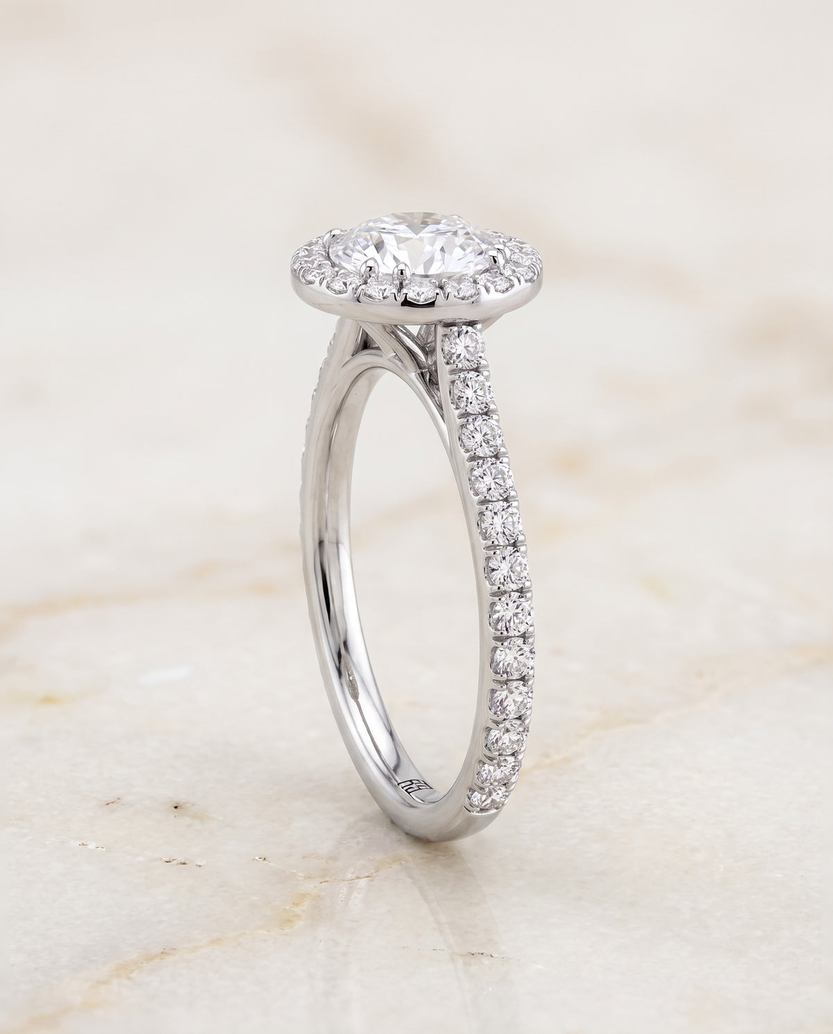 The Christina East West Horizontal Halo Round Engagement Ring Setting in Platinum