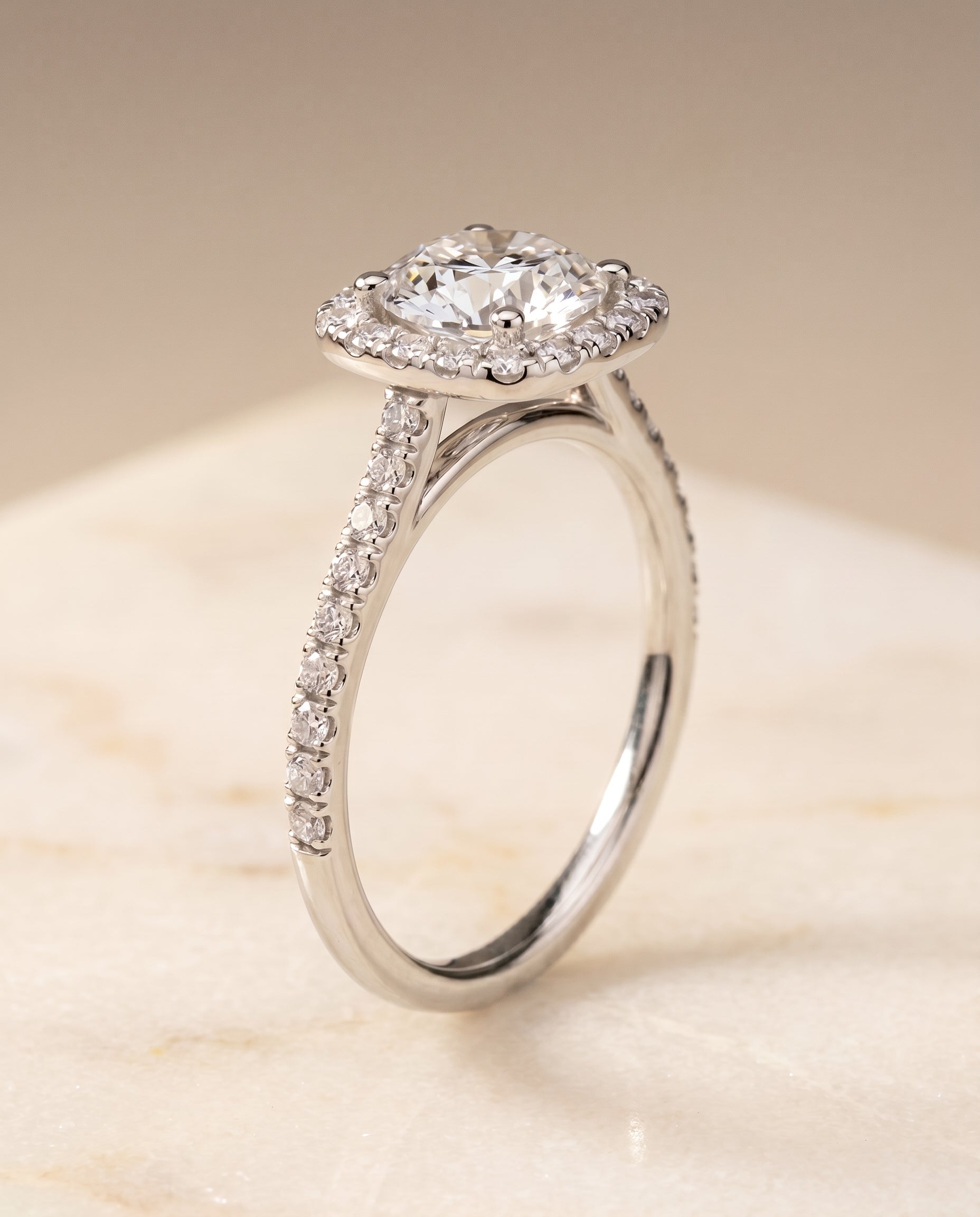 Pavé Halo styling on The Cosette round engagement ring setting | RockHer