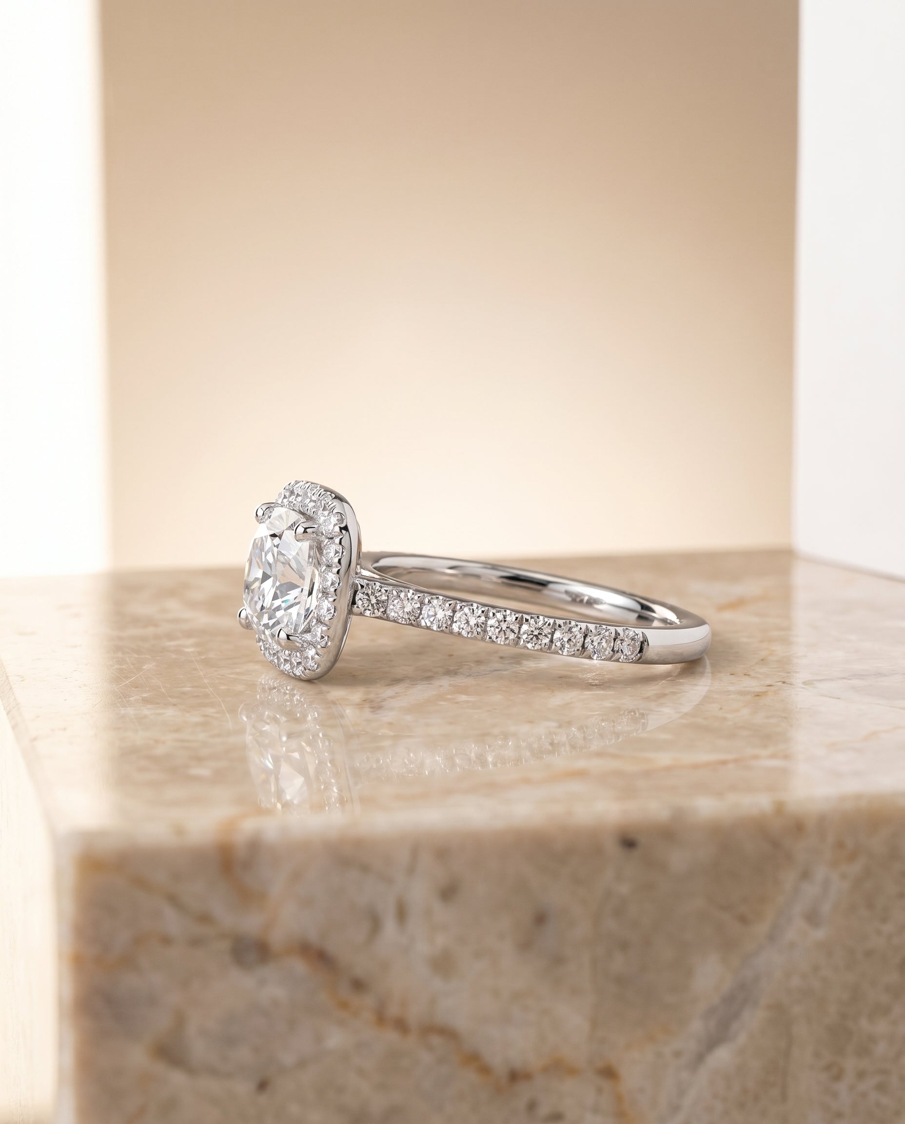 Cosette Select Pavé Halo Cushion Cut Lab Diamond Engagement Ring in Platinum, side view | RockHer