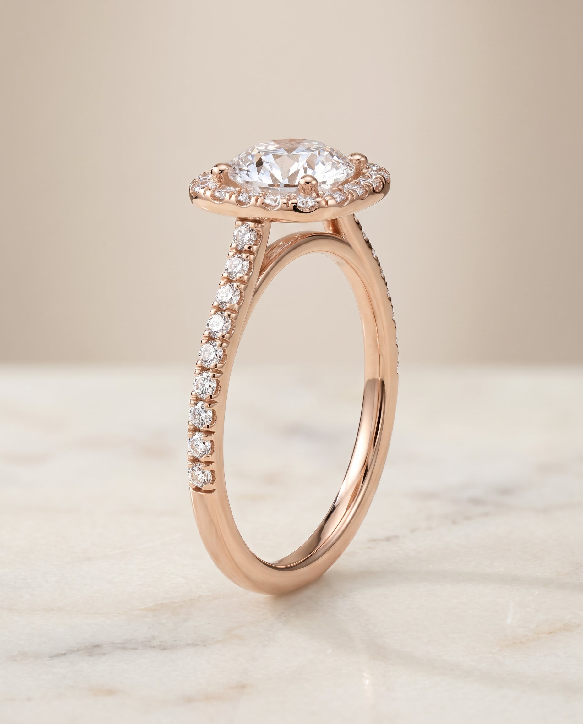 Pavé Halo styling on The Cosette round engagement ring setting | RockHer