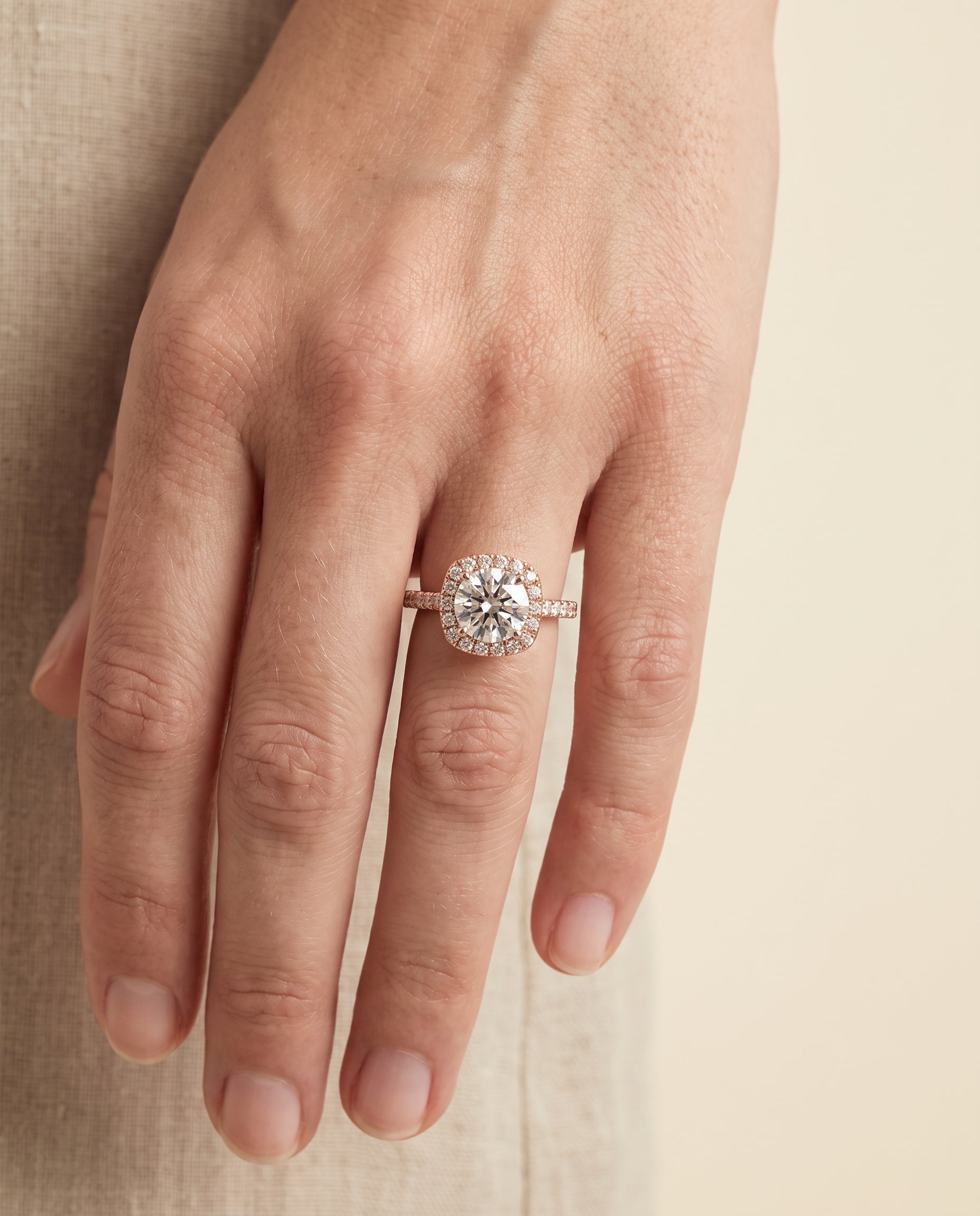 The Cosette engagement ring setting in 14K Rose Gold, pavé halo design | RockHer