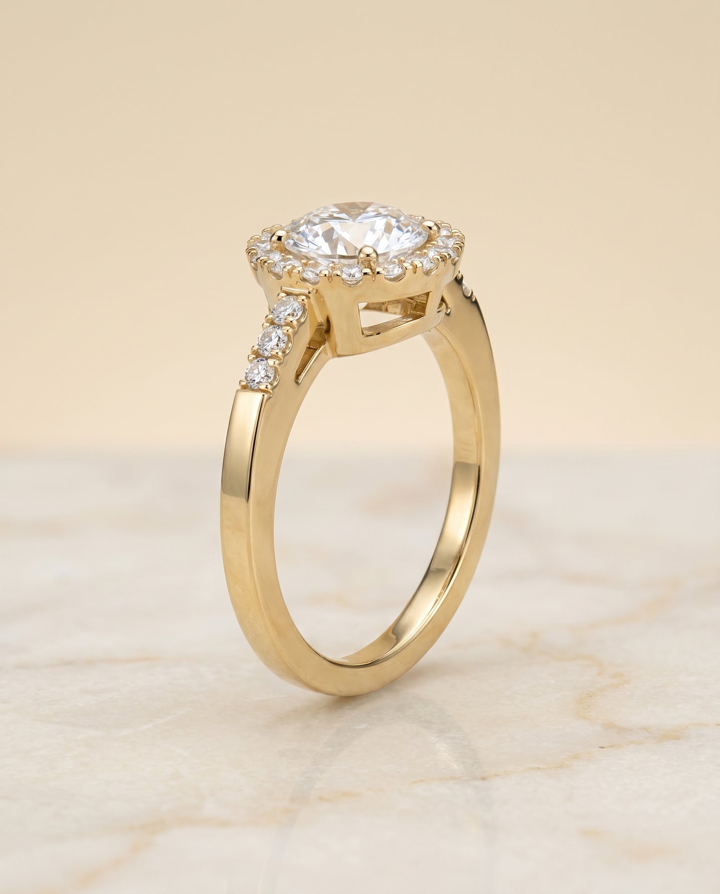 The Crimson East West Pavé Halo Engagement Ring Setting for Round Diamonds in 18K Yellow Gold