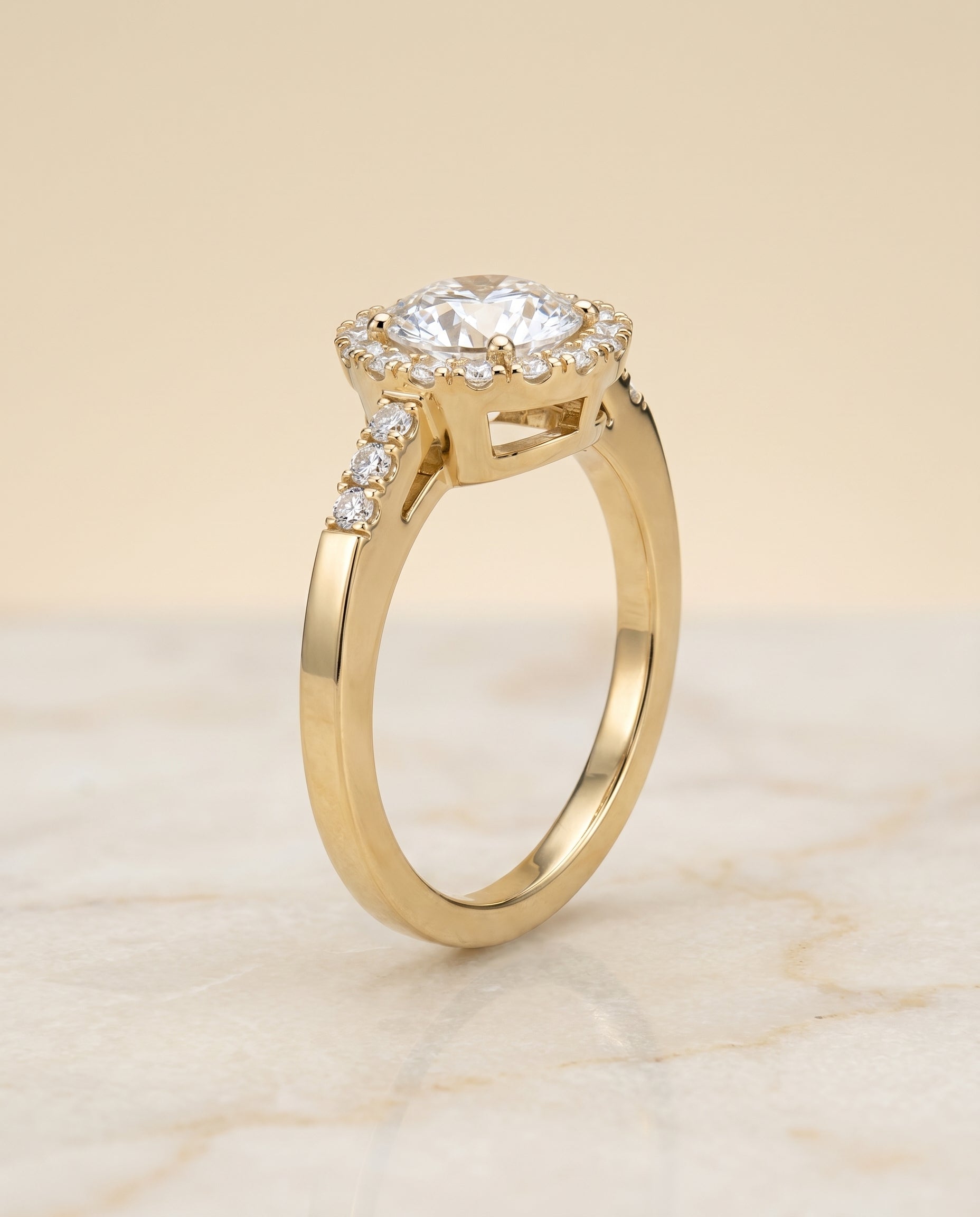 East West Horizontal Halo styling on The Crimson round engagement ring setting | RockHer