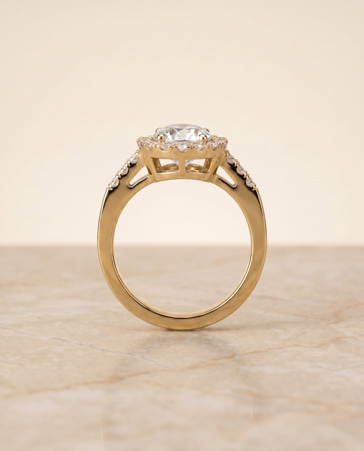 The Crimson East West Pavé Halo Engagement Ring Setting for Round Diamonds in 18K Yellow Gold