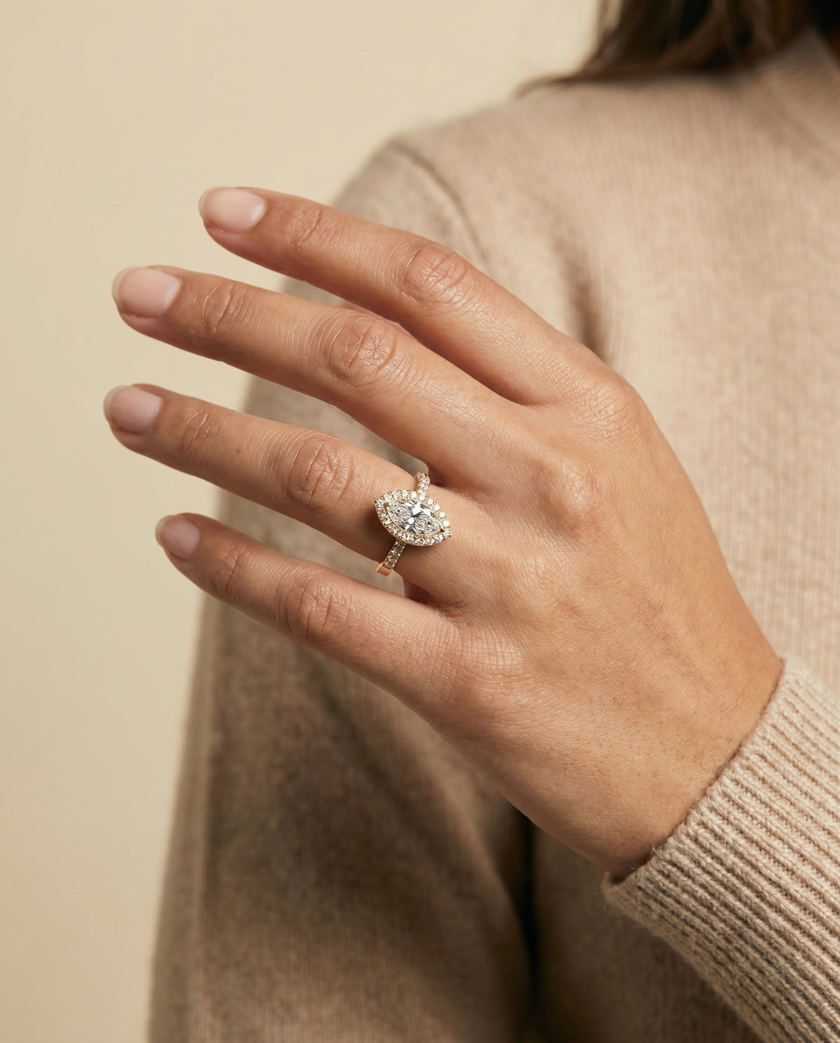 Crimson Select Halo Marquise Lab Diamond Engagement Ring in 18K Yellow Gold, shown on hand | RockHer