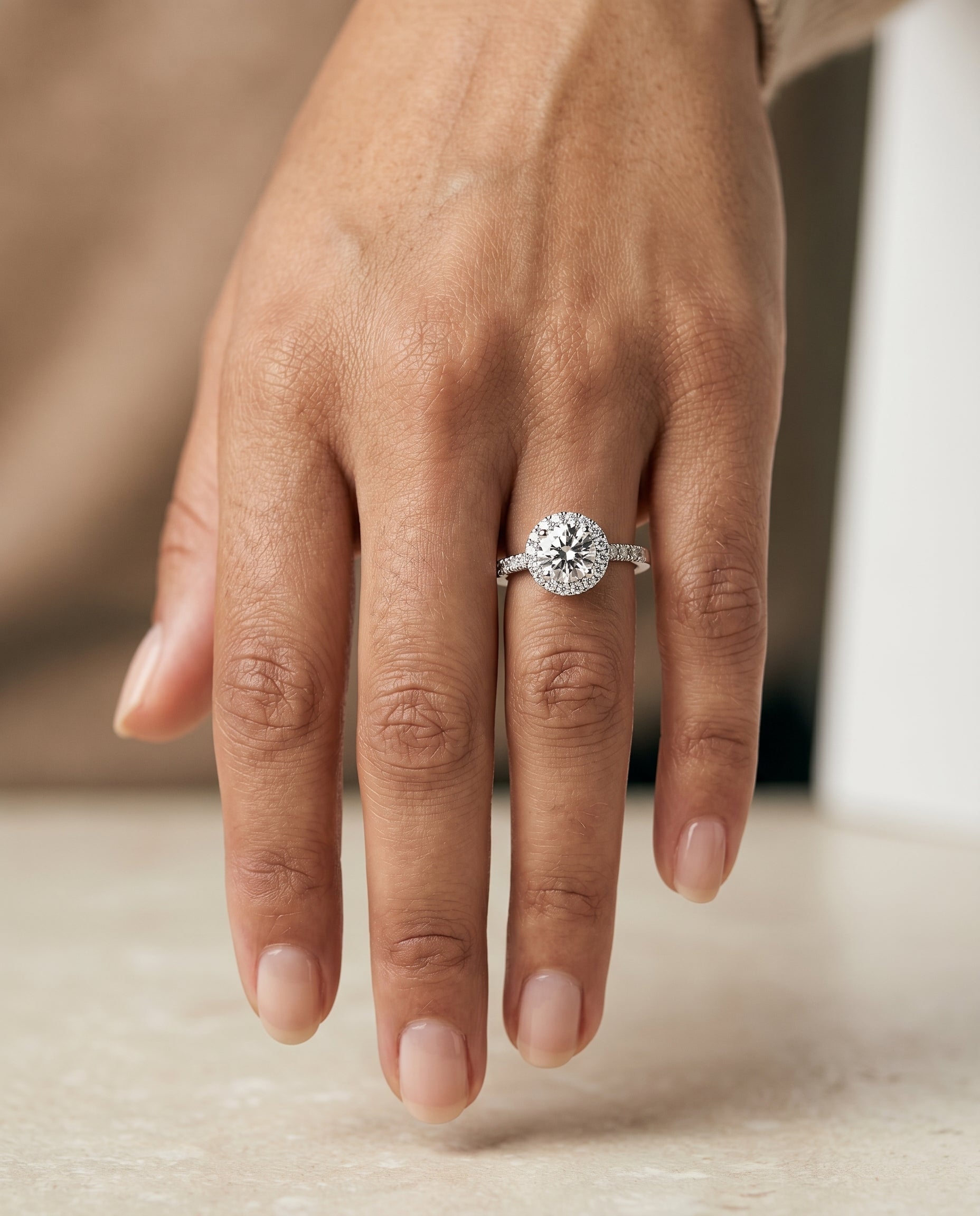 Crimson Select Halo Round Lab Diamond Engagement Ring in 18K White Gold, shown on hand | RockHer