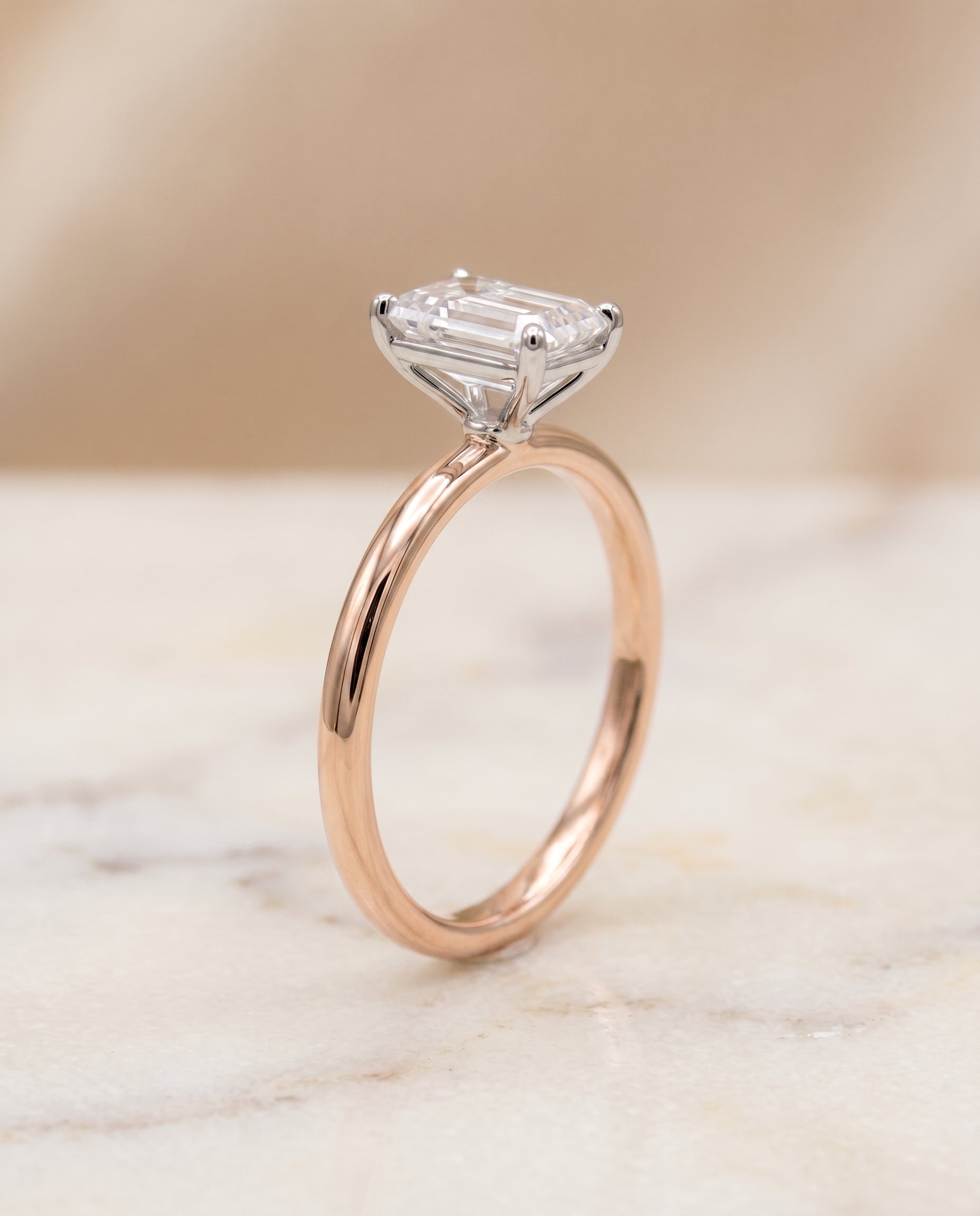 Curved Hidden Halo Solitaire Cut styling on The Cyndi emerald engagement ring setting | RockHer