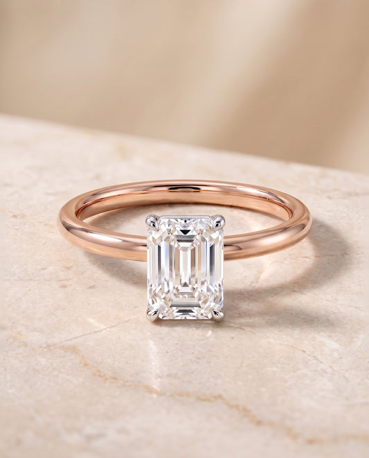 The Cyndi Curved Hidden Halo Solitaire Emerald Cut Engagement Ring Setting in 14K Rose Gold