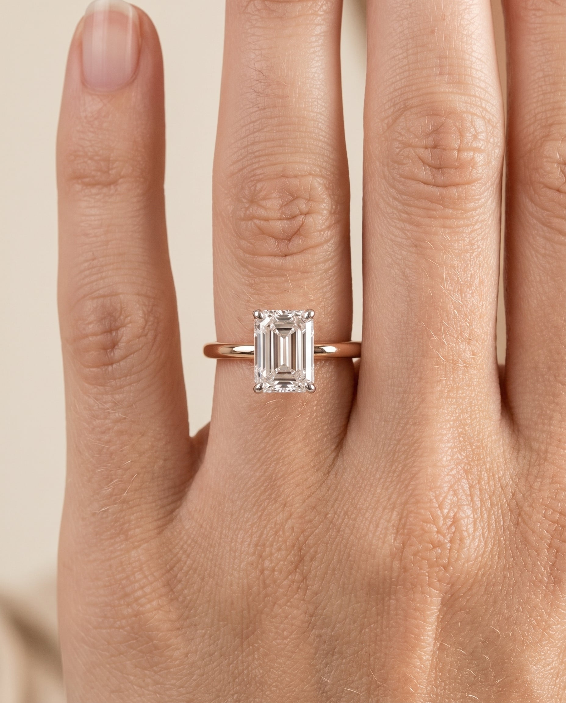 The Cyndi engagement ring setting in 14K Rose Gold, curved hidden halo solitaire cut design | RockHer
