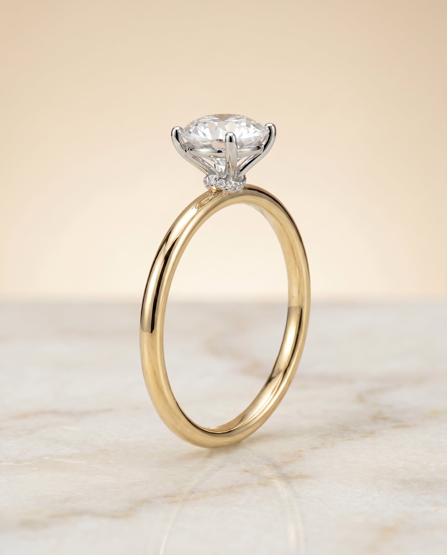 Curved Hidden Halo Solitaire styling on The Cyndi round engagement ring setting | RockHer