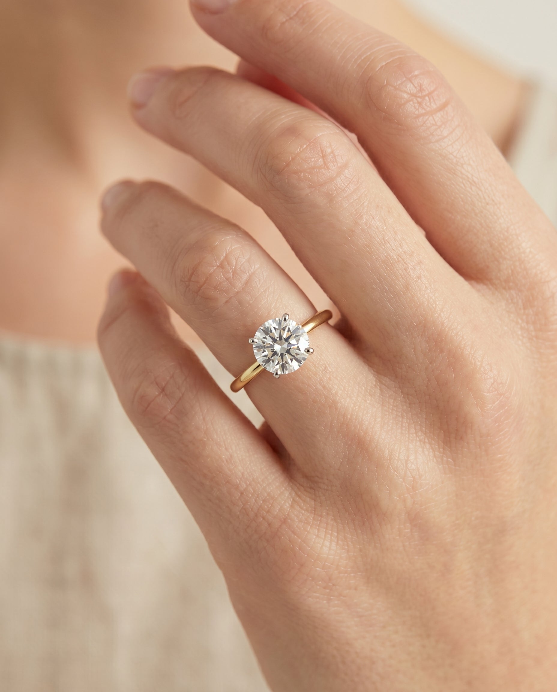 The Cyndi setting for round diamonds, made to order in 18K Yellow Gold | RockHer