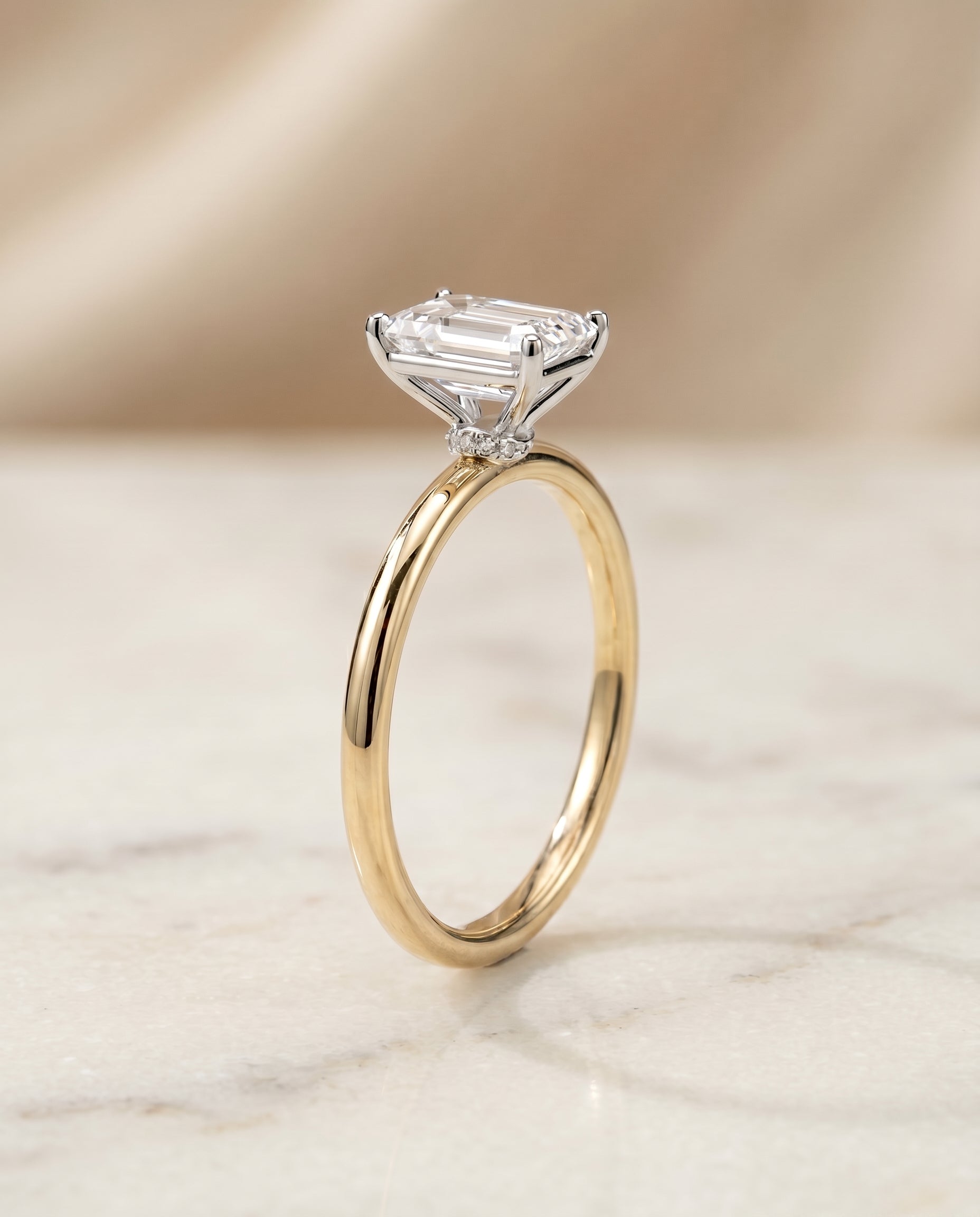 Curved Hidden Halo Solitaire Cut styling on The Cyndi emerald engagement ring setting | RockHer