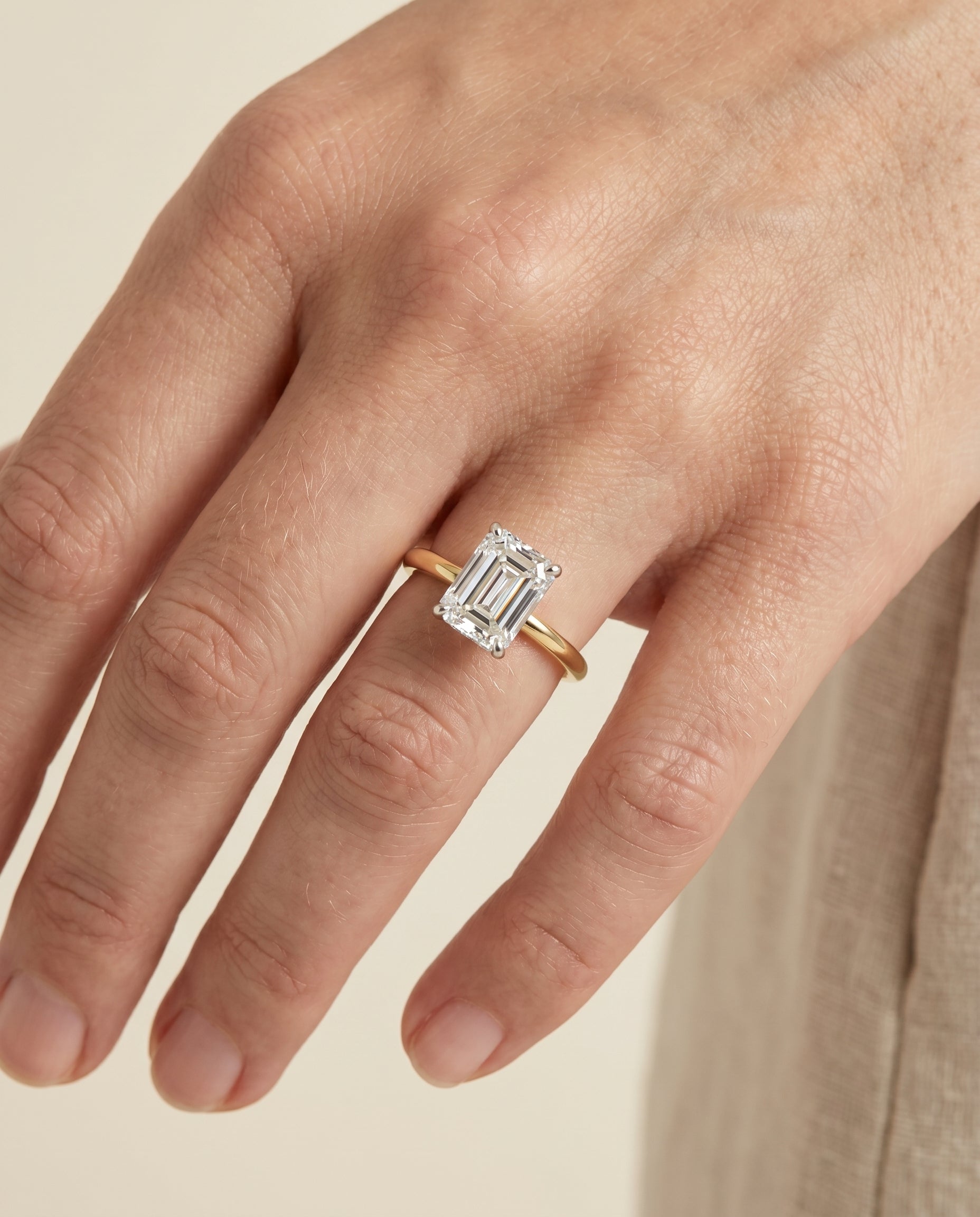 The Cyndi engagement ring setting in 18K Yellow Gold, curved hidden halo solitaire cut design | RockHer