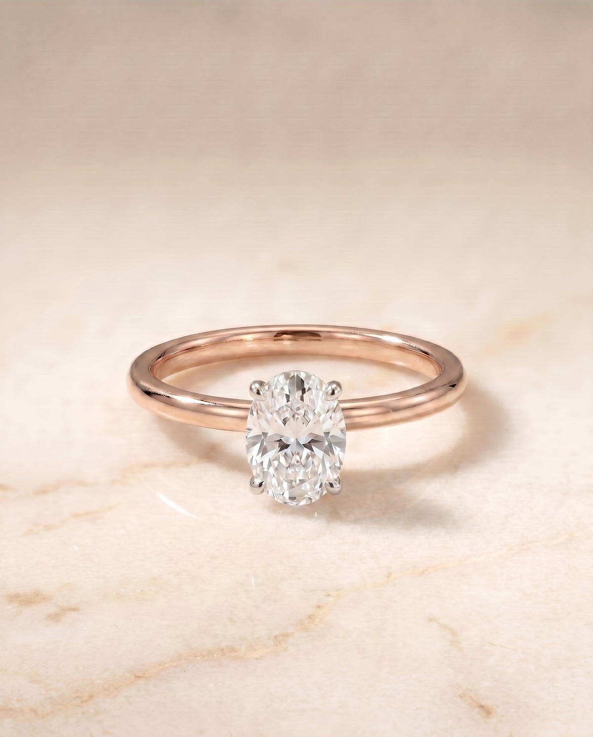 Cyndi Select Solitaire Oval Lab Diamond Engagement Ring in 14K Rose Gold, shown on hand, angled | RockHer