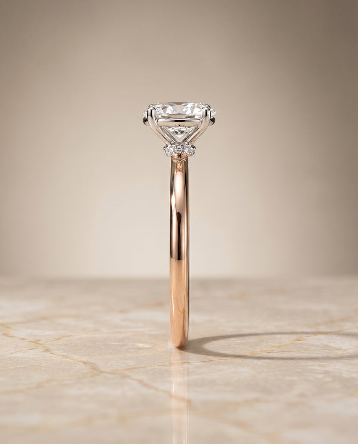 The Cyndi Curved Hidden Halo Solitaire Oval Engagement Ring Setting in 14K Rose Gold