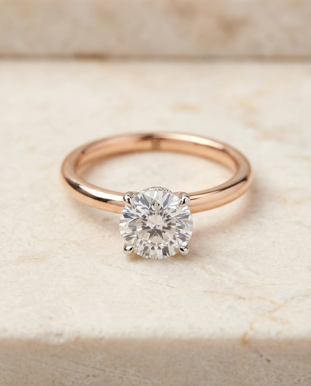 Cyndi Select Solitaire Round Lab Diamond Engagement Ring in 14K Rose Gold, shown on hand, angled | RockHer