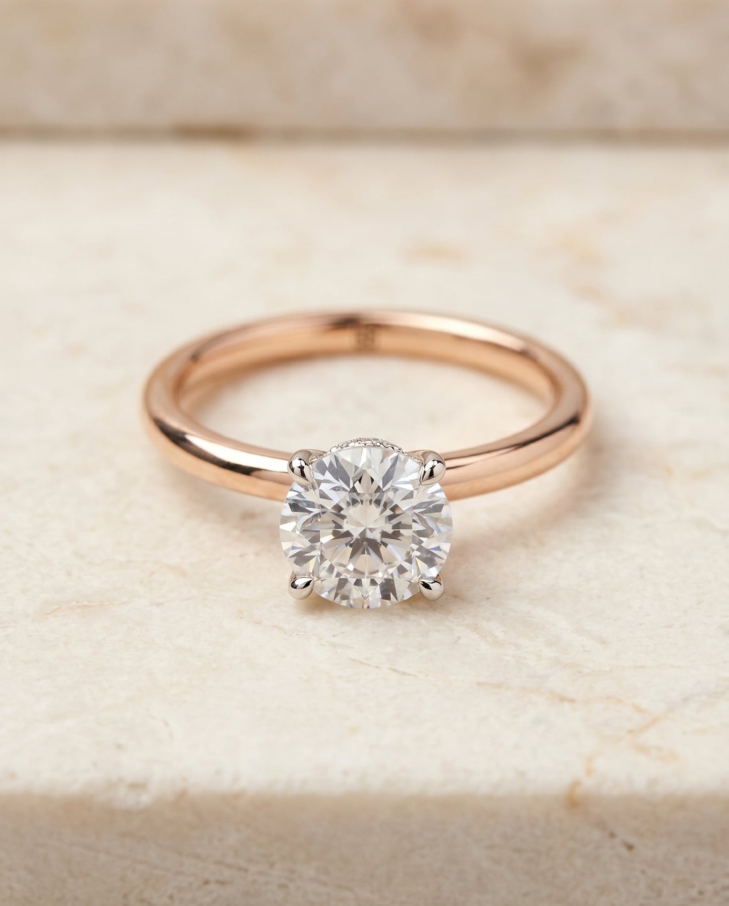 Cyndi Select Solitaire Round Lab Diamond Engagement Ring in 14K Rose Gold, shown on hand, angled | RockHer