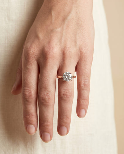 The Cyndi Curved Hidden Halo Solitaire Round Engagement Ring Setting in 14K Rose Gold