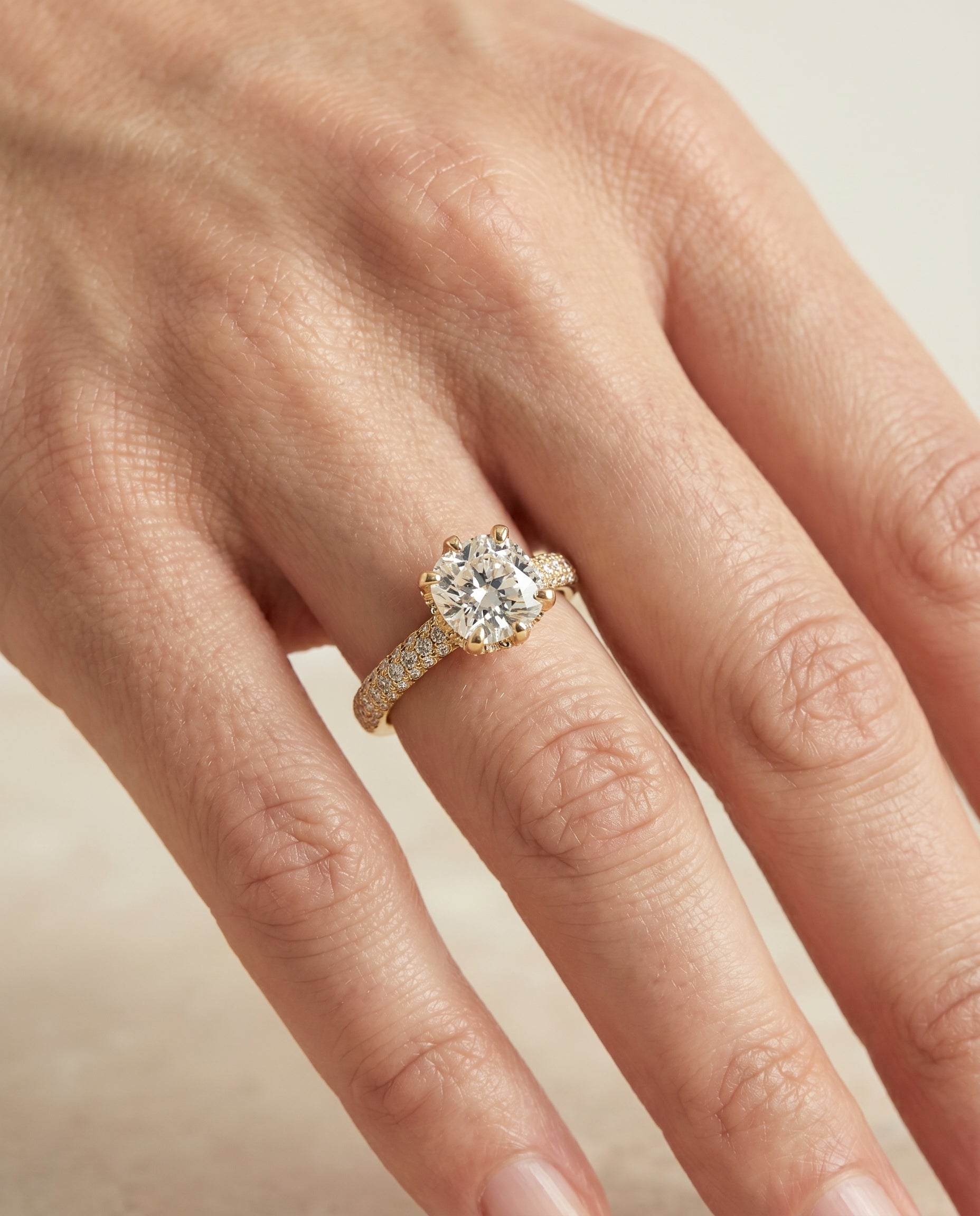 The Daisy engagement ring setting in 18K Yellow Gold, three row french pavé cut design | RockHer