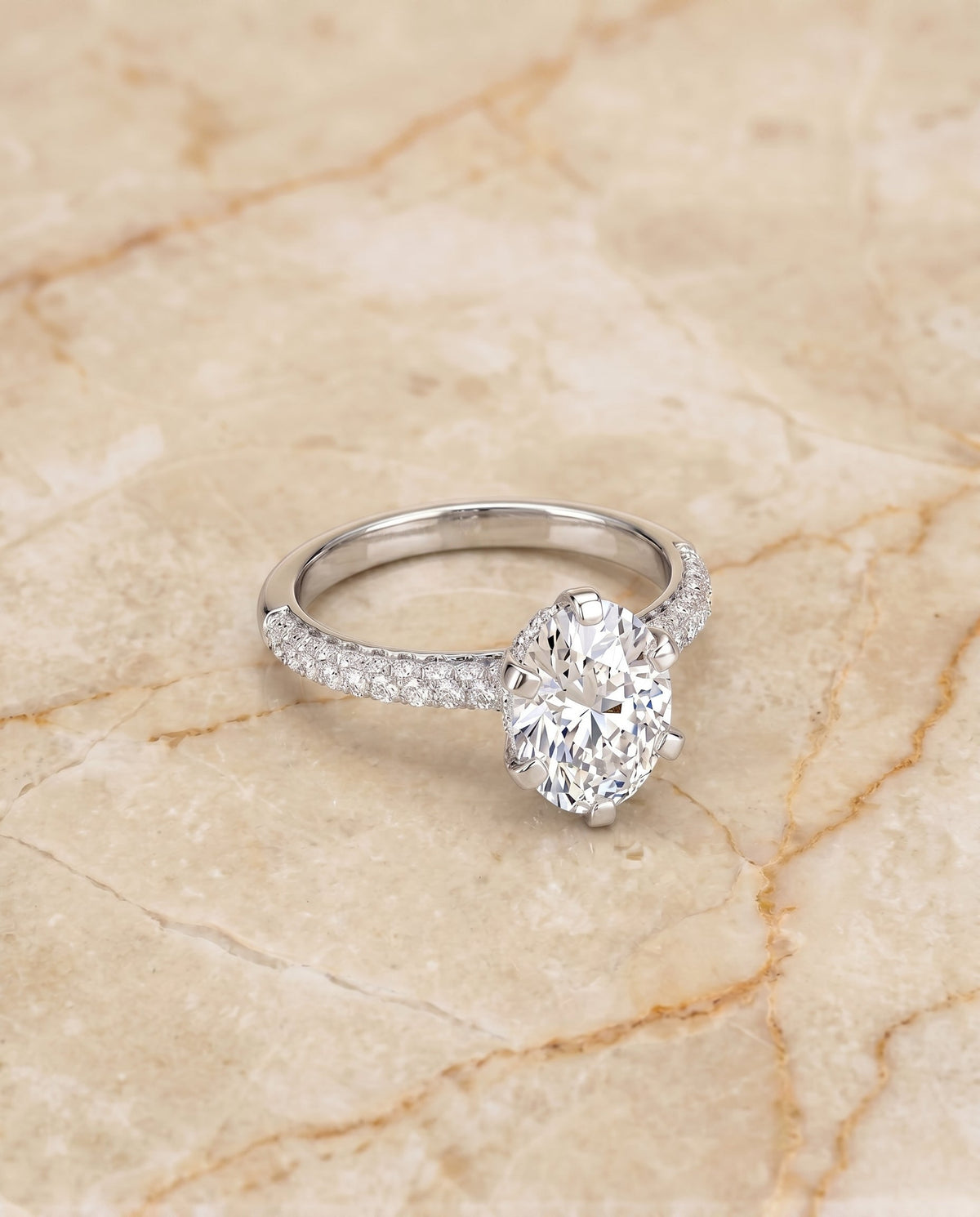 Daisy Select Pavé Oval Lab Diamond Engagement Ring in 18K White Gold, shown on hand, angled | RockHer