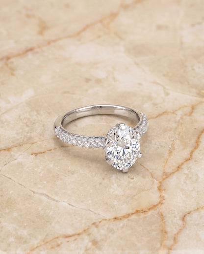 Daisy Select Pavé Oval Lab Diamond Engagement Ring in 18K White Gold, shown on hand, angled | RockHer