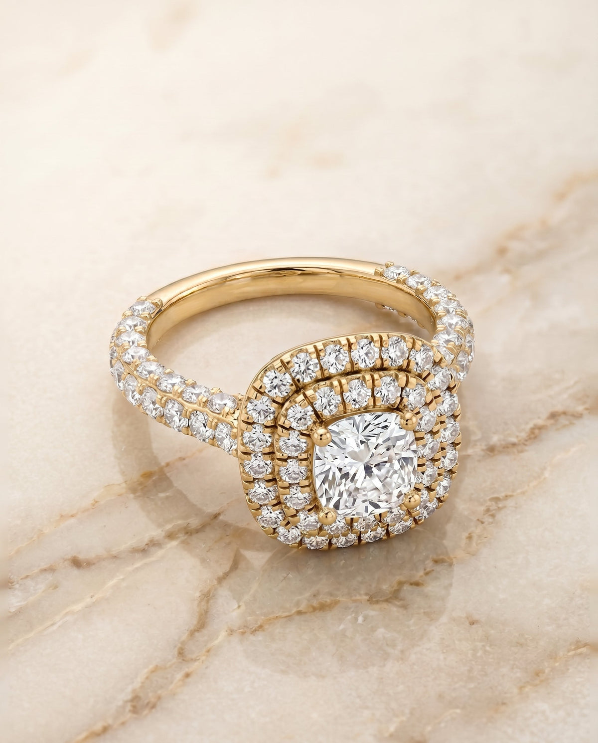 Dinah Select Double Halo Cushion Cut Lab Diamond Engagement Ring in 18K Yellow Gold, shown on hand, angled | RockHer