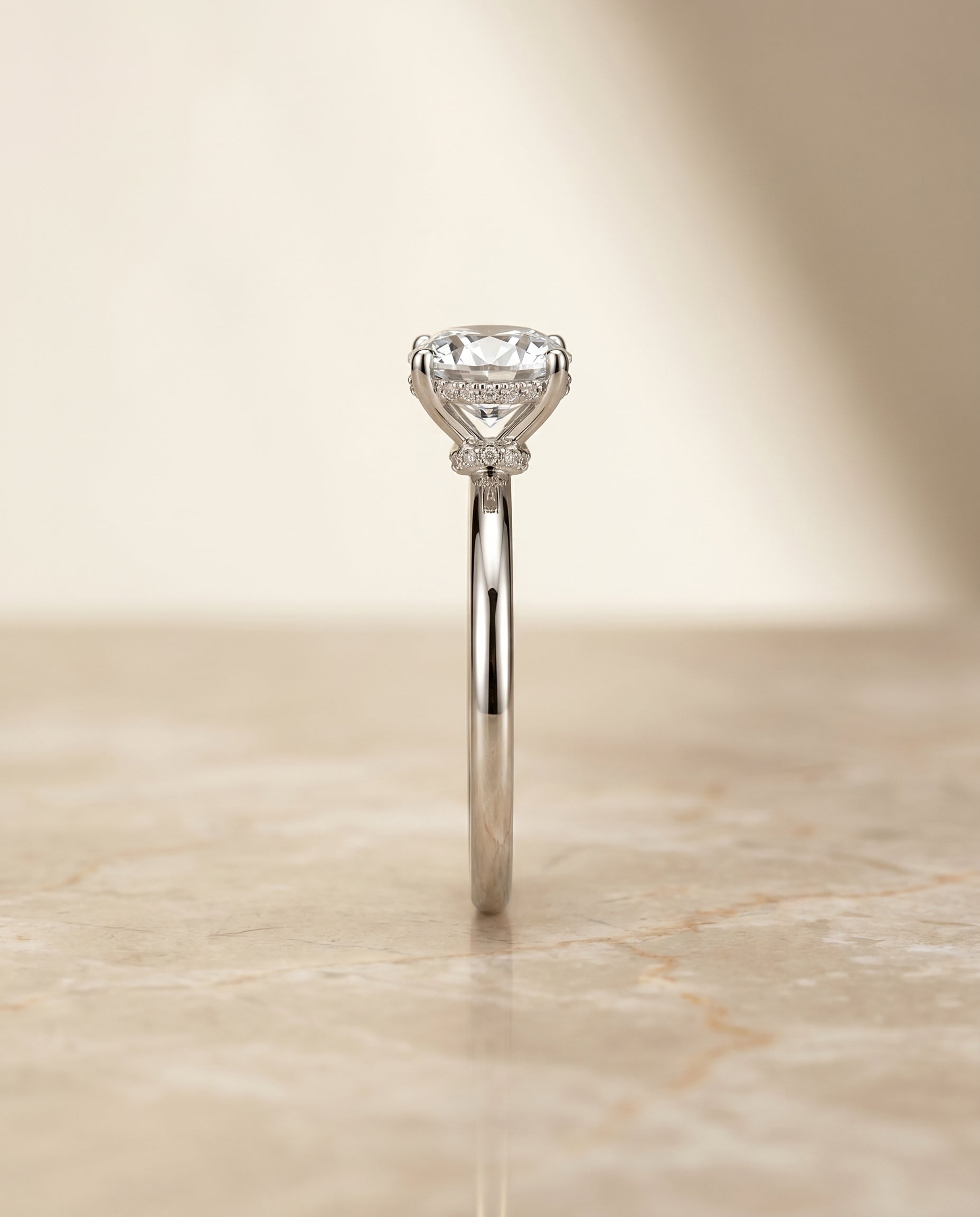 The Dolly double hidden halo solitaire engagement ring setting, shown in Platinum | RockHer