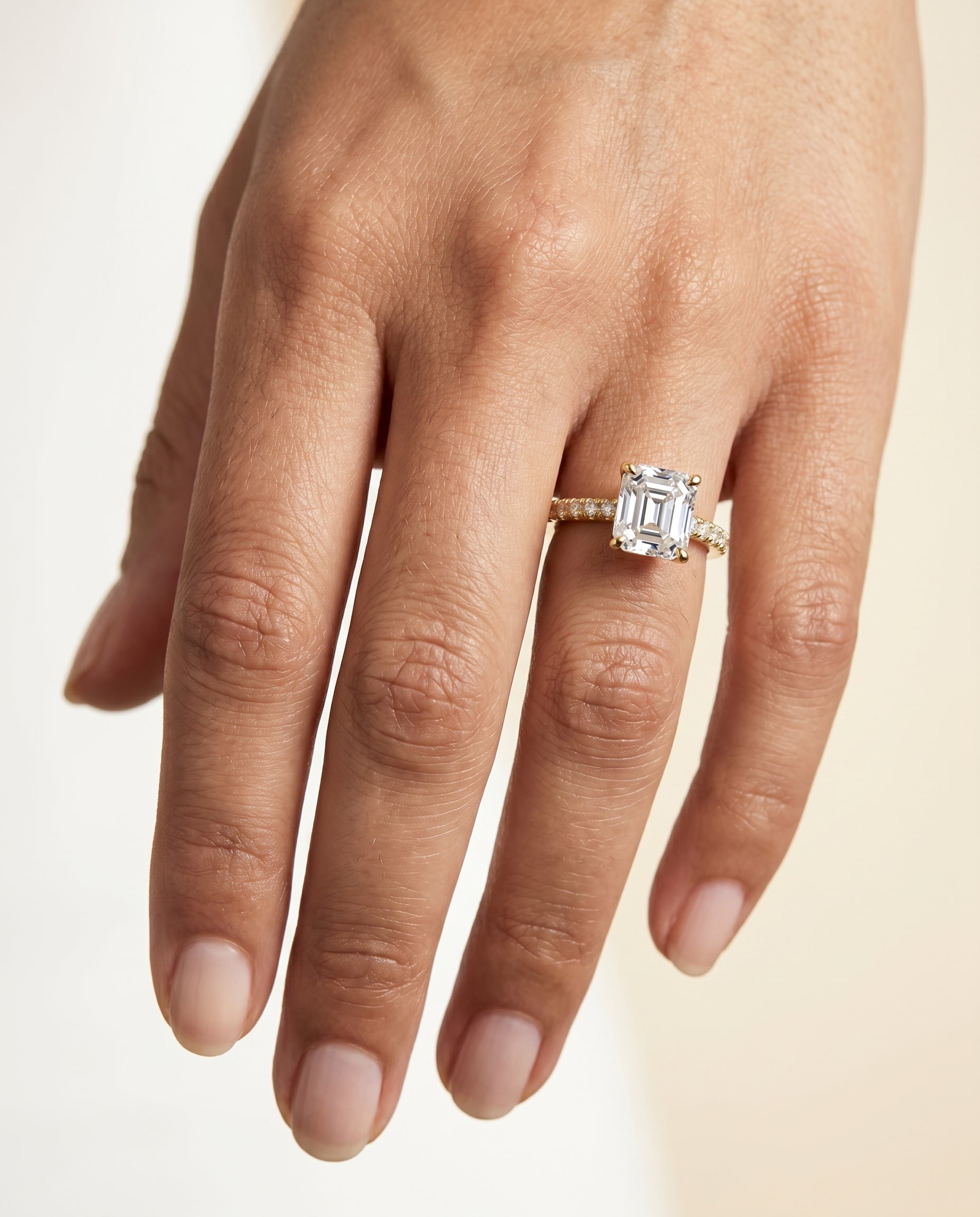 The Donna engagement ring setting in 18K Yellow Gold, cathedral french pavé solitaire cut design | RockHer