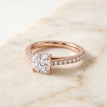 The Donna Cathedral French Pavé Solitaire Cushion Cut Engagement Ring Setting in 14K Rose Gold