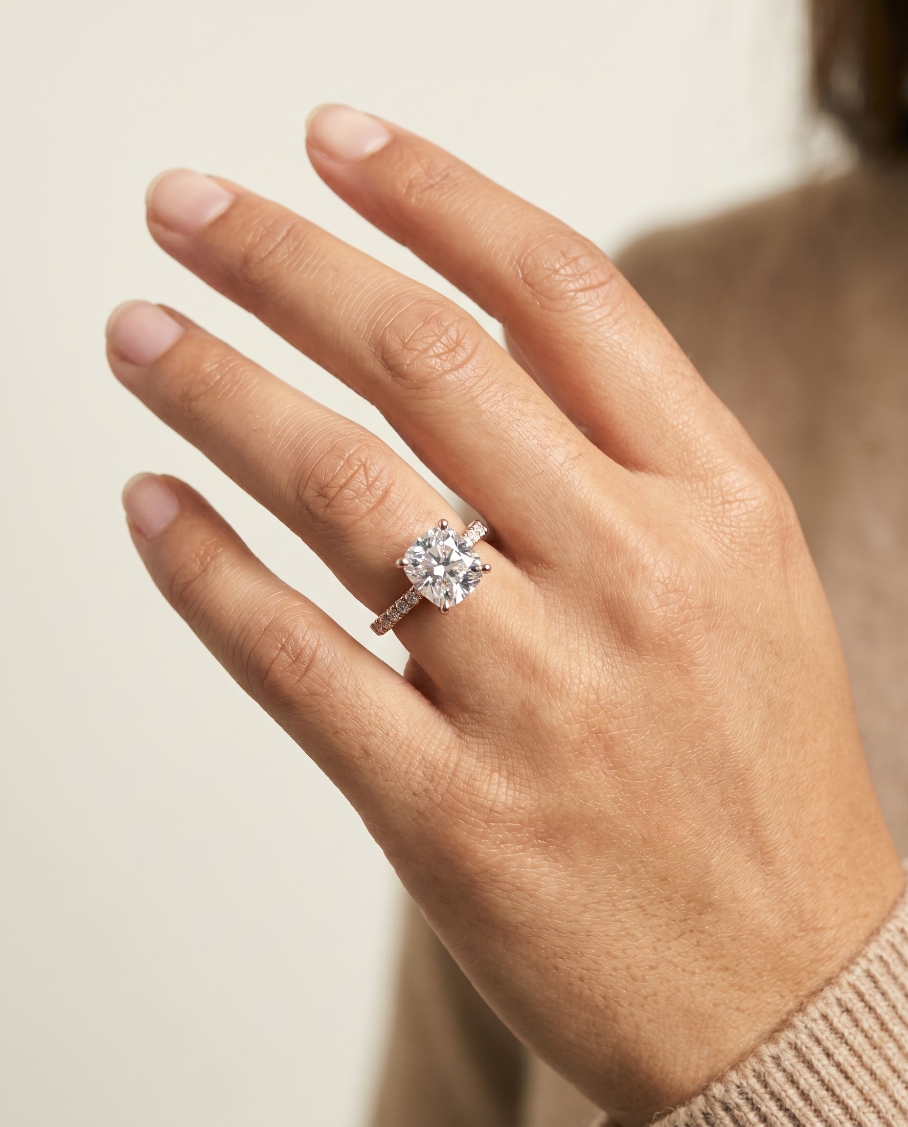 The Donna engagement ring setting in 14K Rose Gold, cathedral french pavé solitaire cut design | RockHer