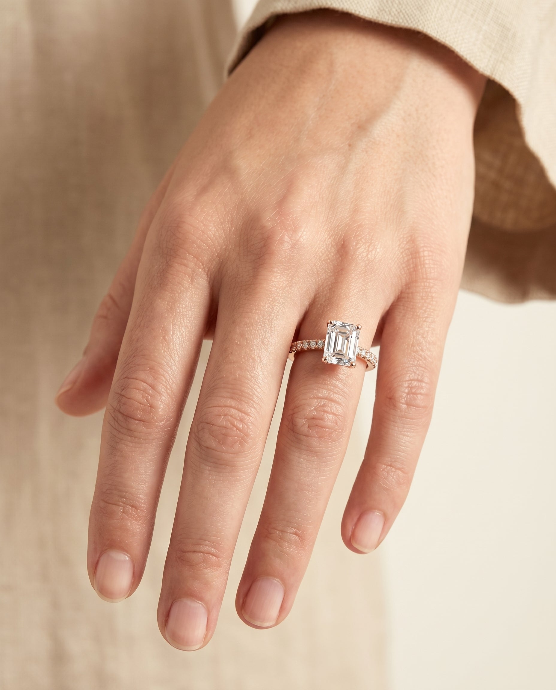 The Donna engagement ring setting in 14K Rose Gold, cathedral french pavé solitaire cut design | RockHer