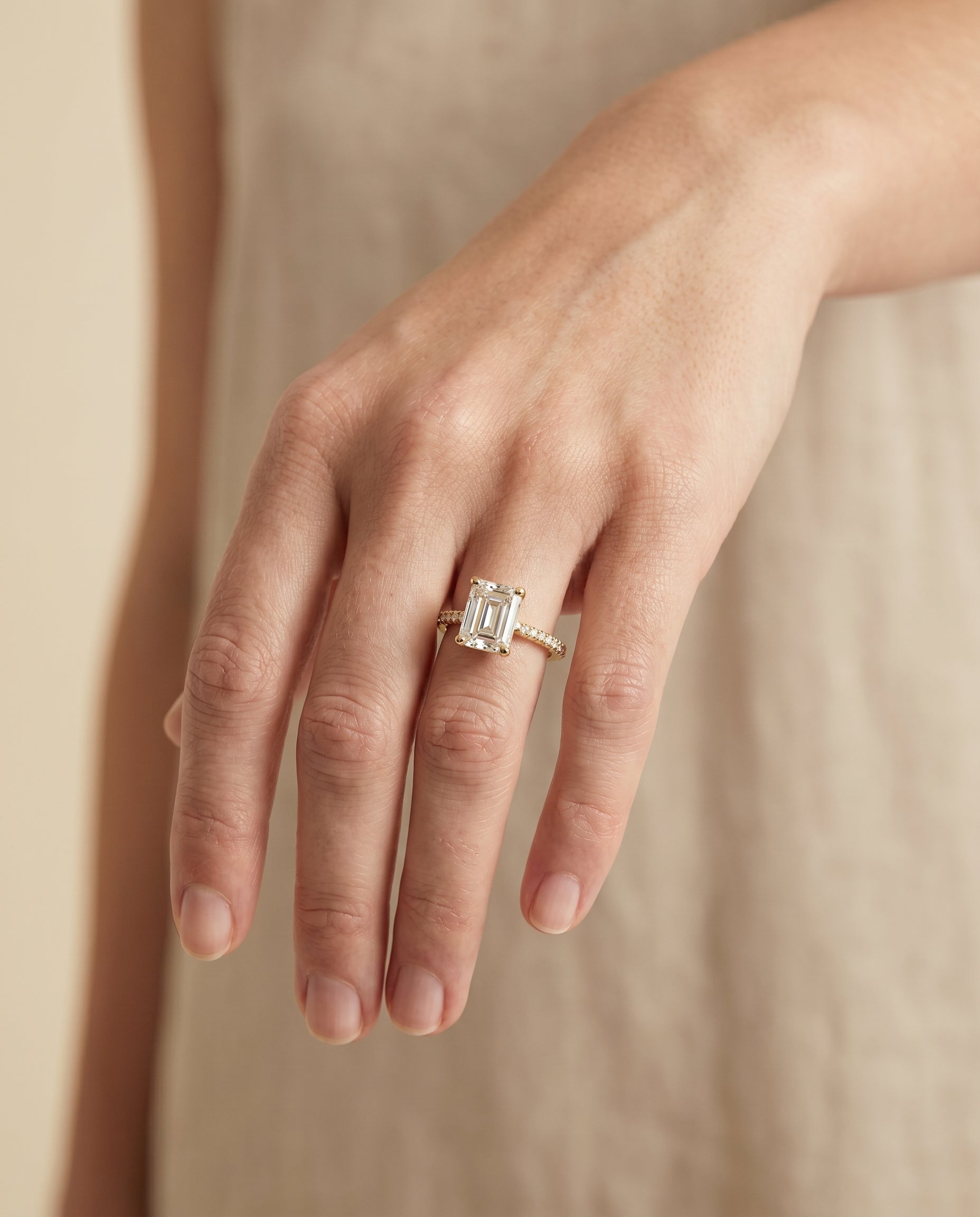 The Donna engagement ring setting in 18K Yellow Gold, select cathedral french pavé solitaire cut design | RockHer