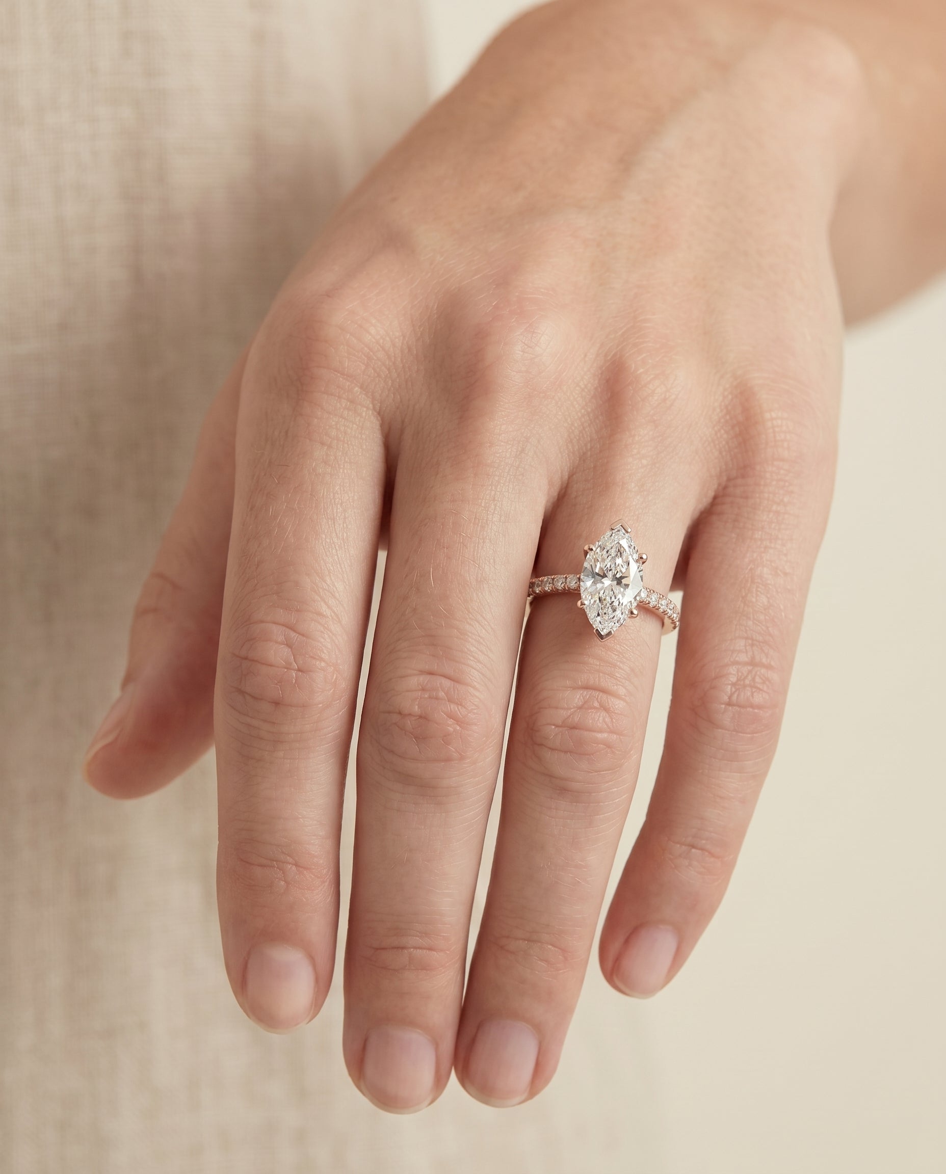 The Donna engagement ring setting in 14K Rose Gold, cathedral french pavé solitaire design | RockHer