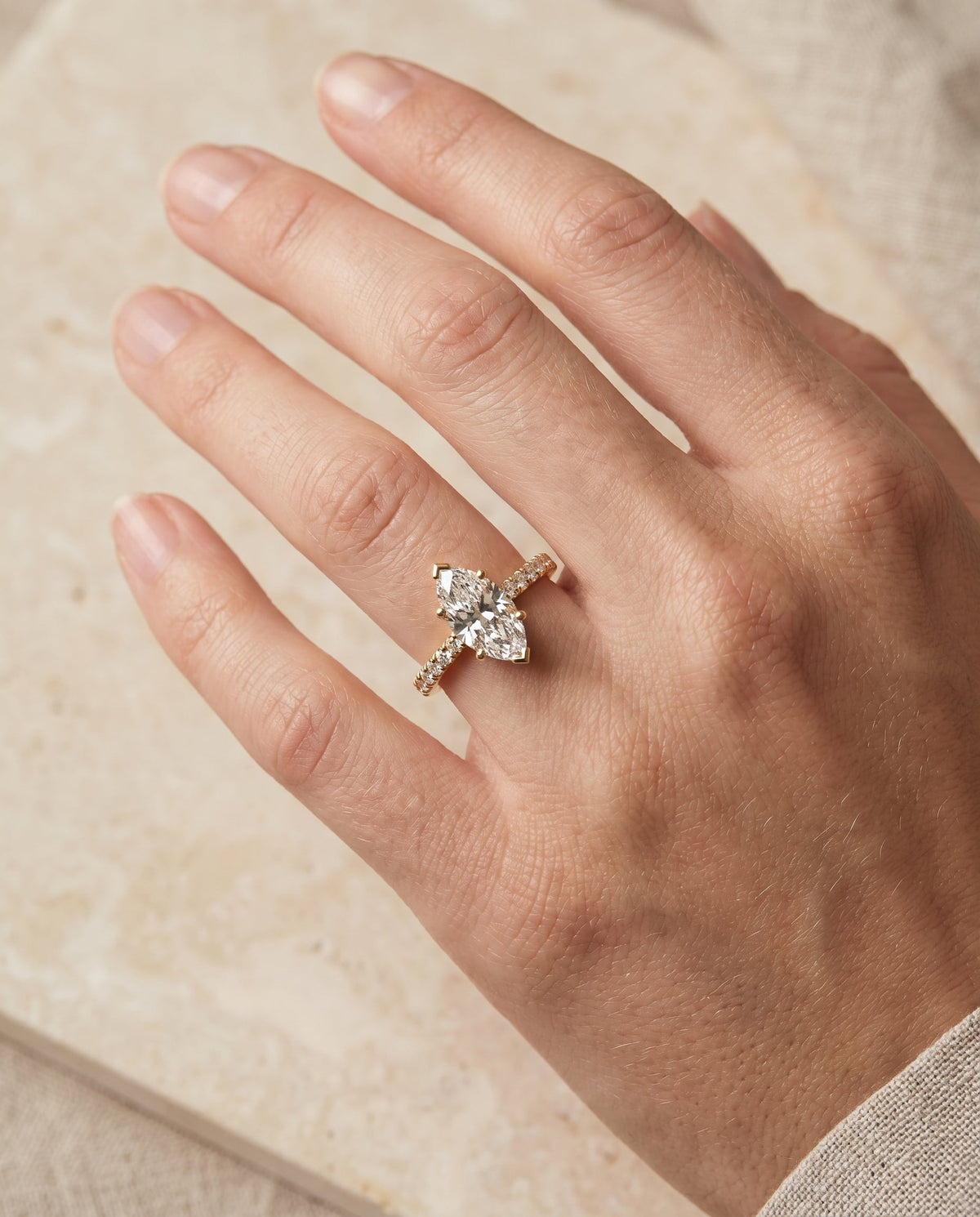 Donna Select Cathedral Marquise Lab Diamond Engagement Ring in 18K Yellow Gold, shown on hand | RockHer