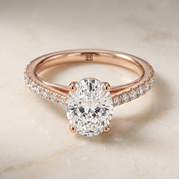 The Donna Cathedral French Pavé Solitaire Oval Engagement Ring Setting in 14K Rose Gold