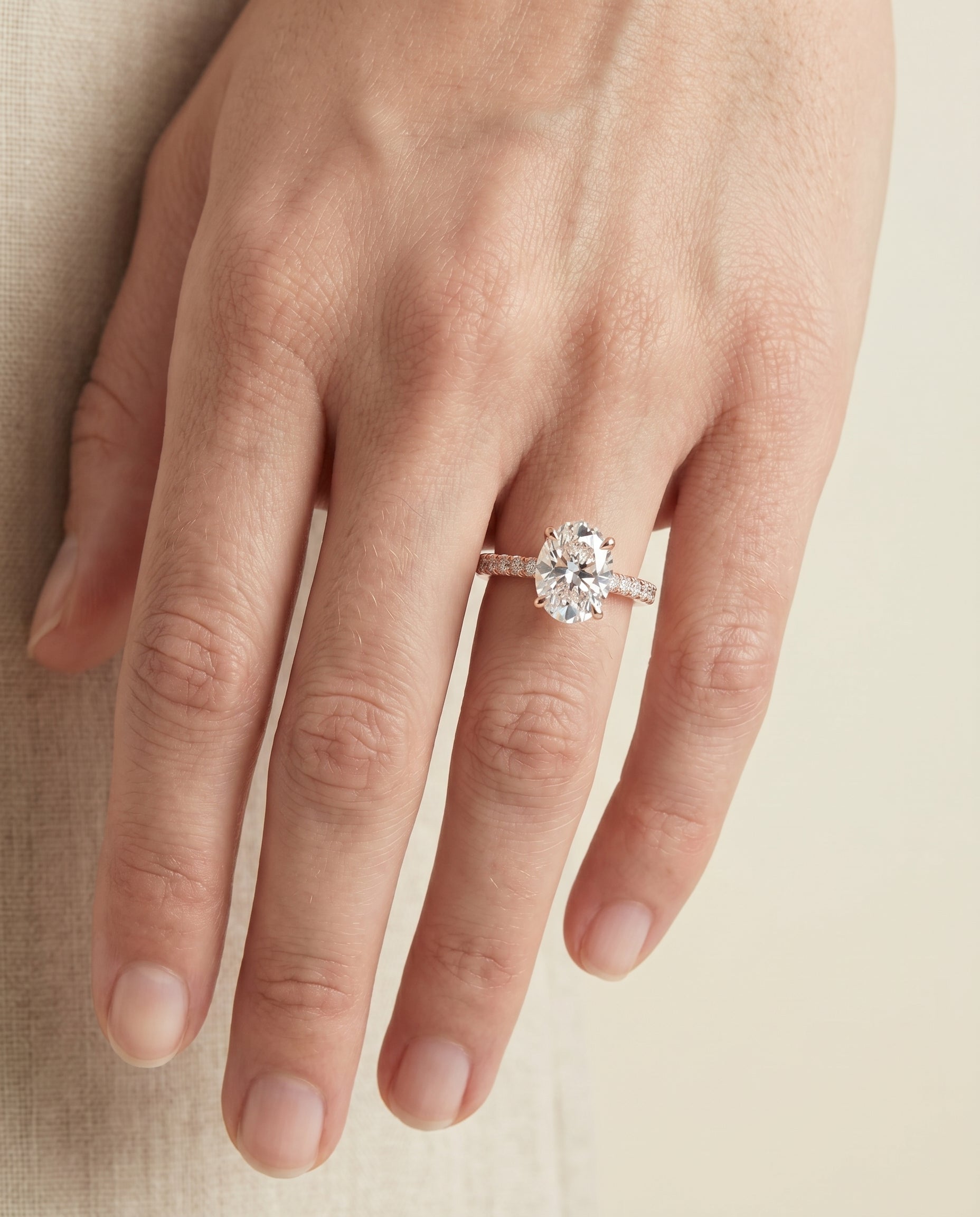 The Donna engagement ring setting in 14K Rose Gold, cathedral french pavé solitaire design | RockHer