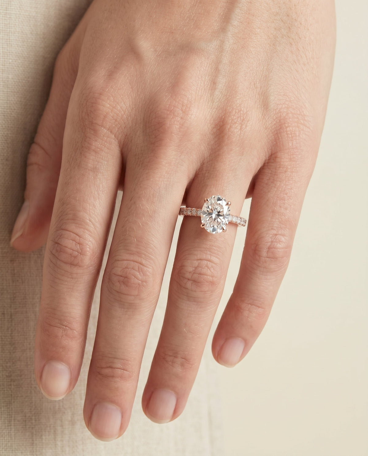 Donna Select Cathedral Oval Lab Diamond Engagement Ring in 14K Rose Gold, shown on hand | RockHer
