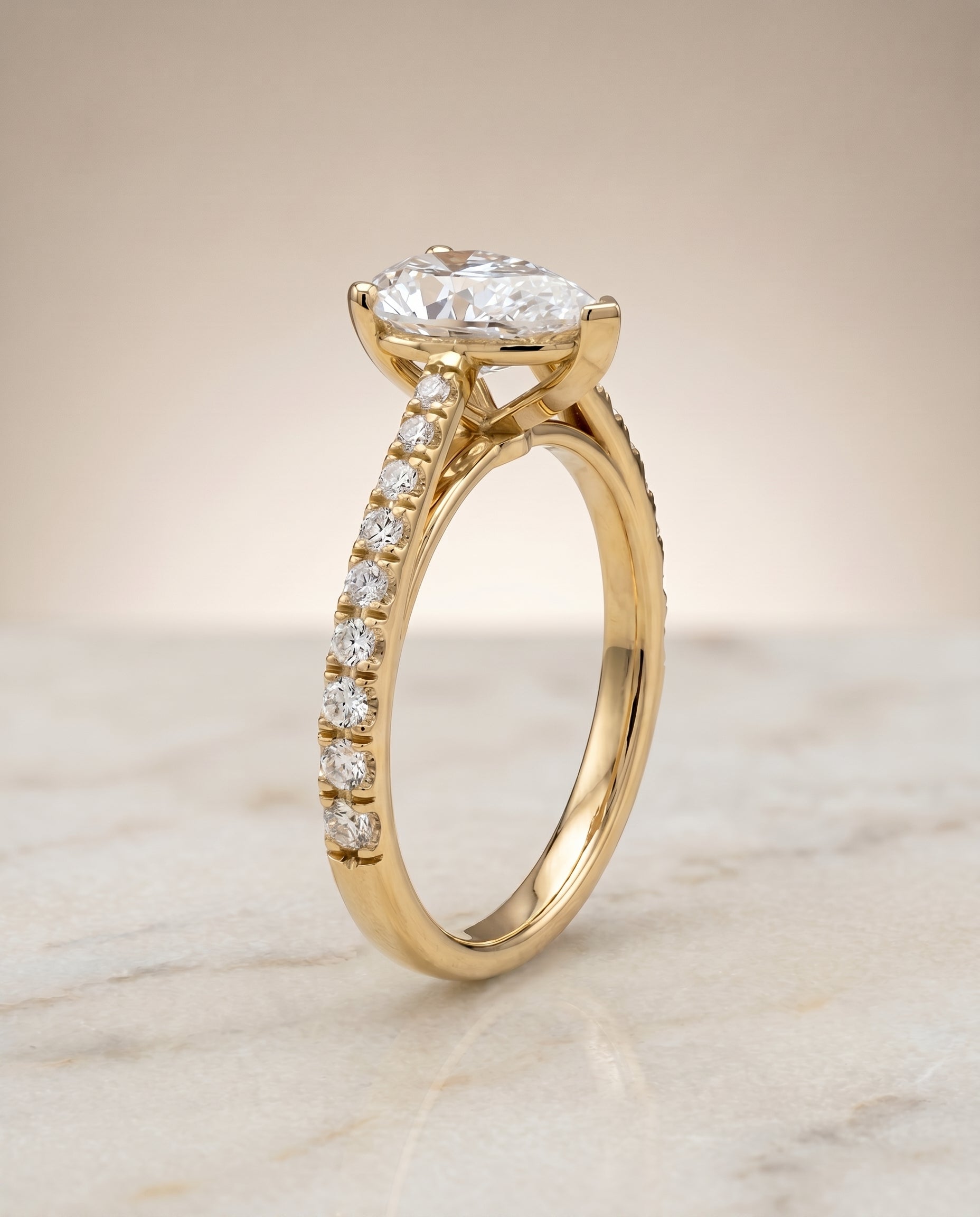 Cathedral French Pavé Solitaire styling on The Donna pear engagement ring setting | RockHer