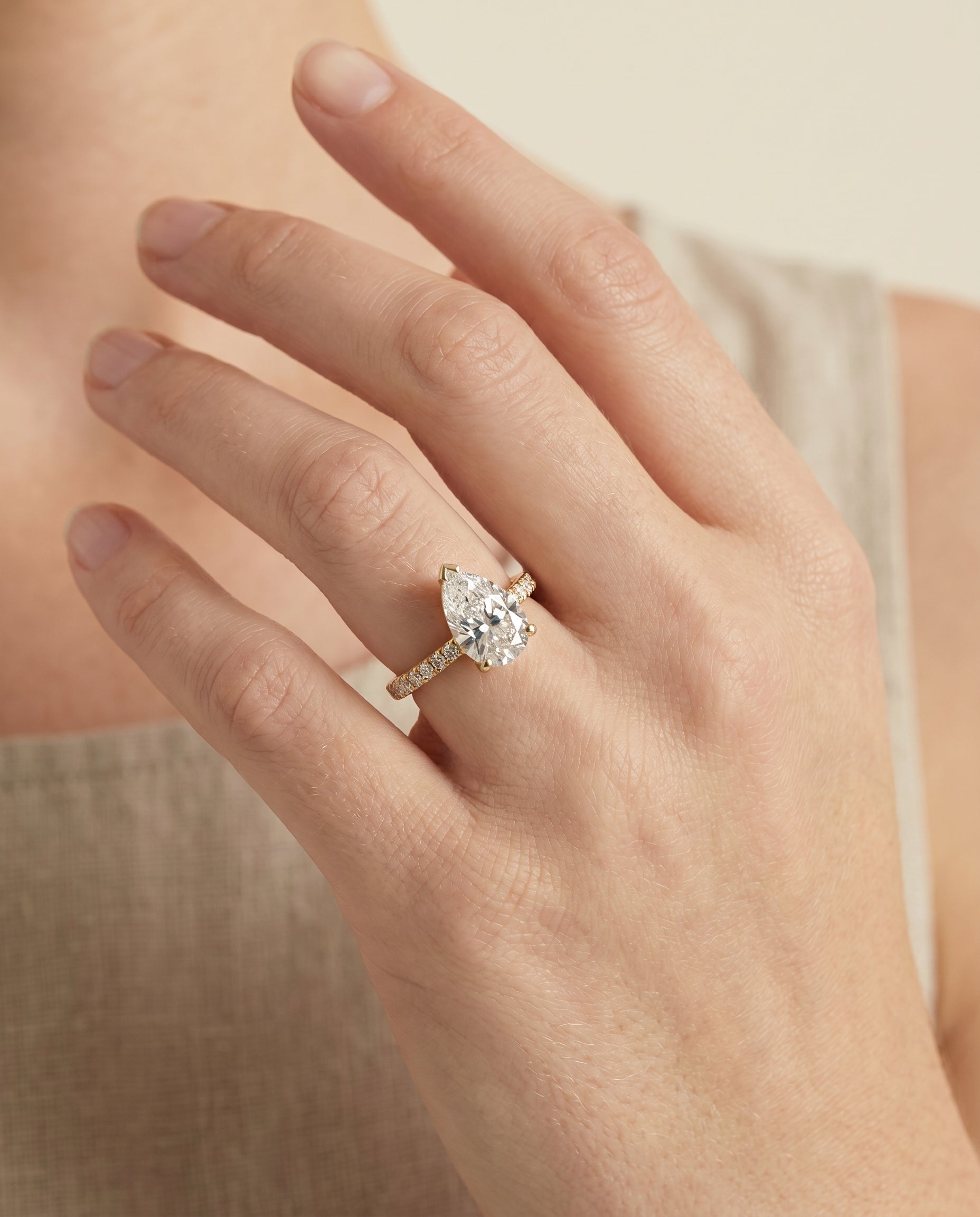 The Donna engagement ring setting in 18K Yellow Gold, cathedral french pavé solitaire design | RockHer