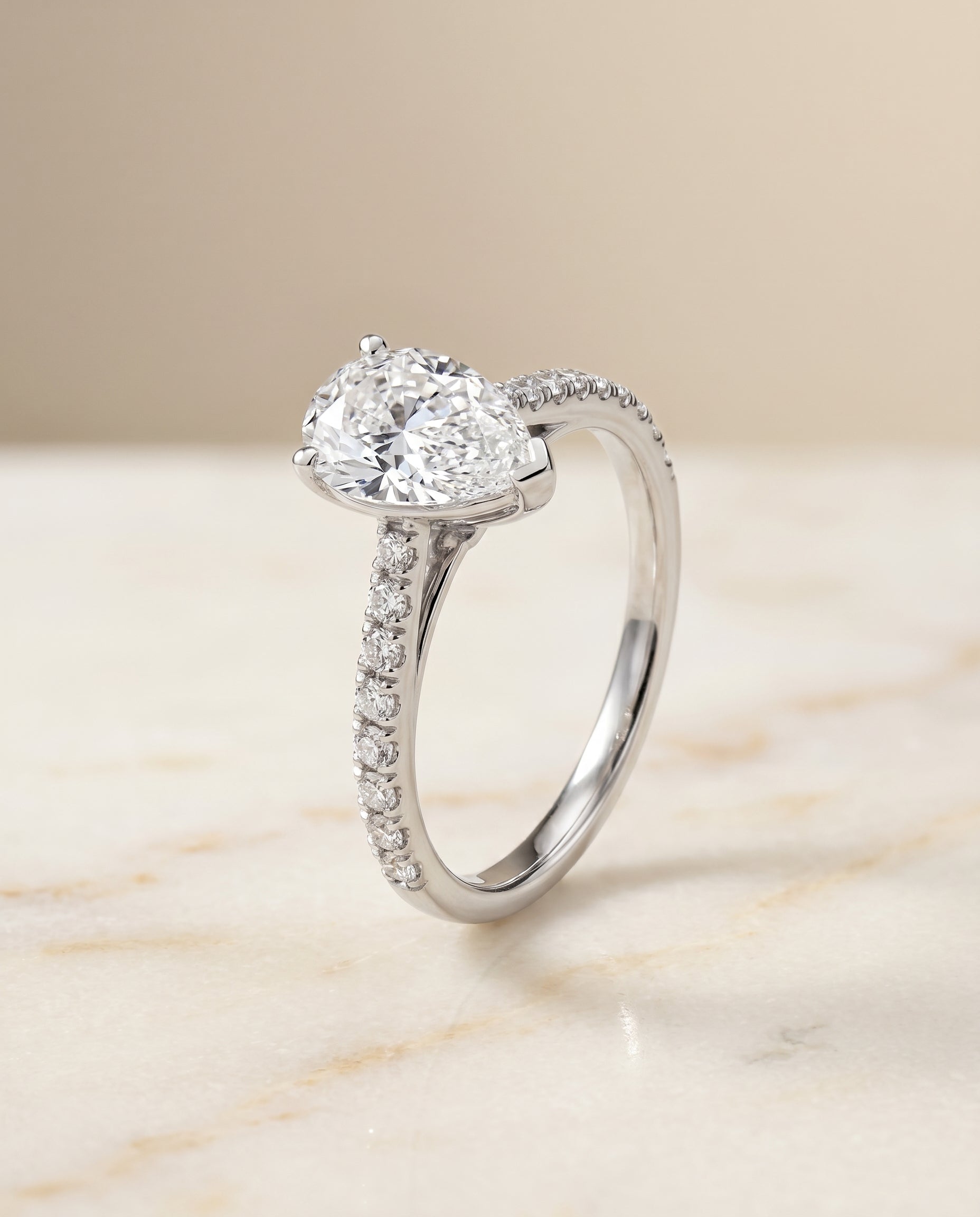 Cathedral French Pavé Solitaire styling on The Donna pear engagement ring setting | RockHer