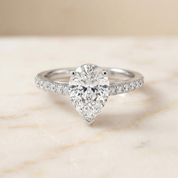 The Donna Cathedral French Pavé Solitaire Pear Engagement Ring Setting in Platinum