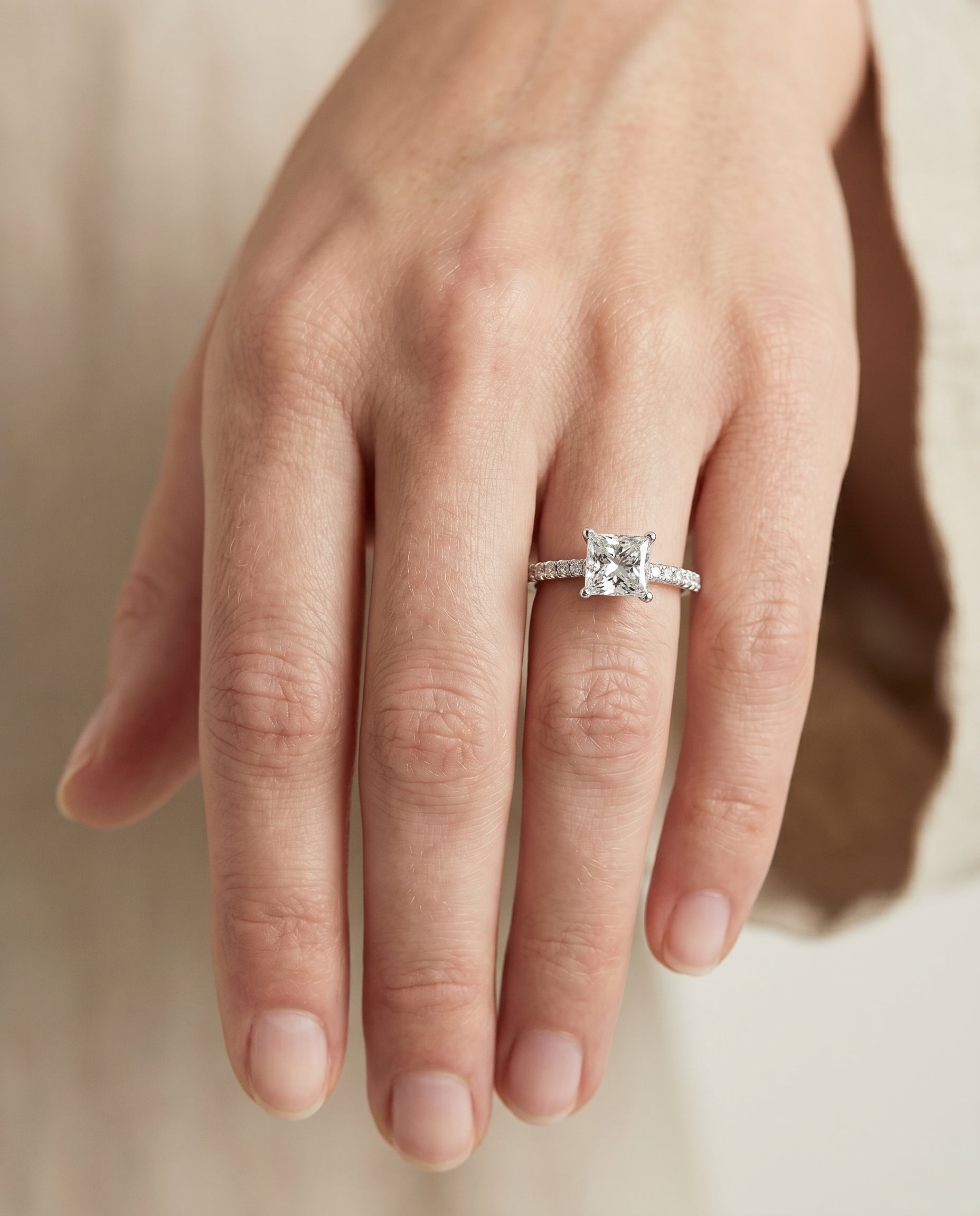 The Donna engagement ring setting in Platinum, cathedral french pavé solitaire design | RockHer