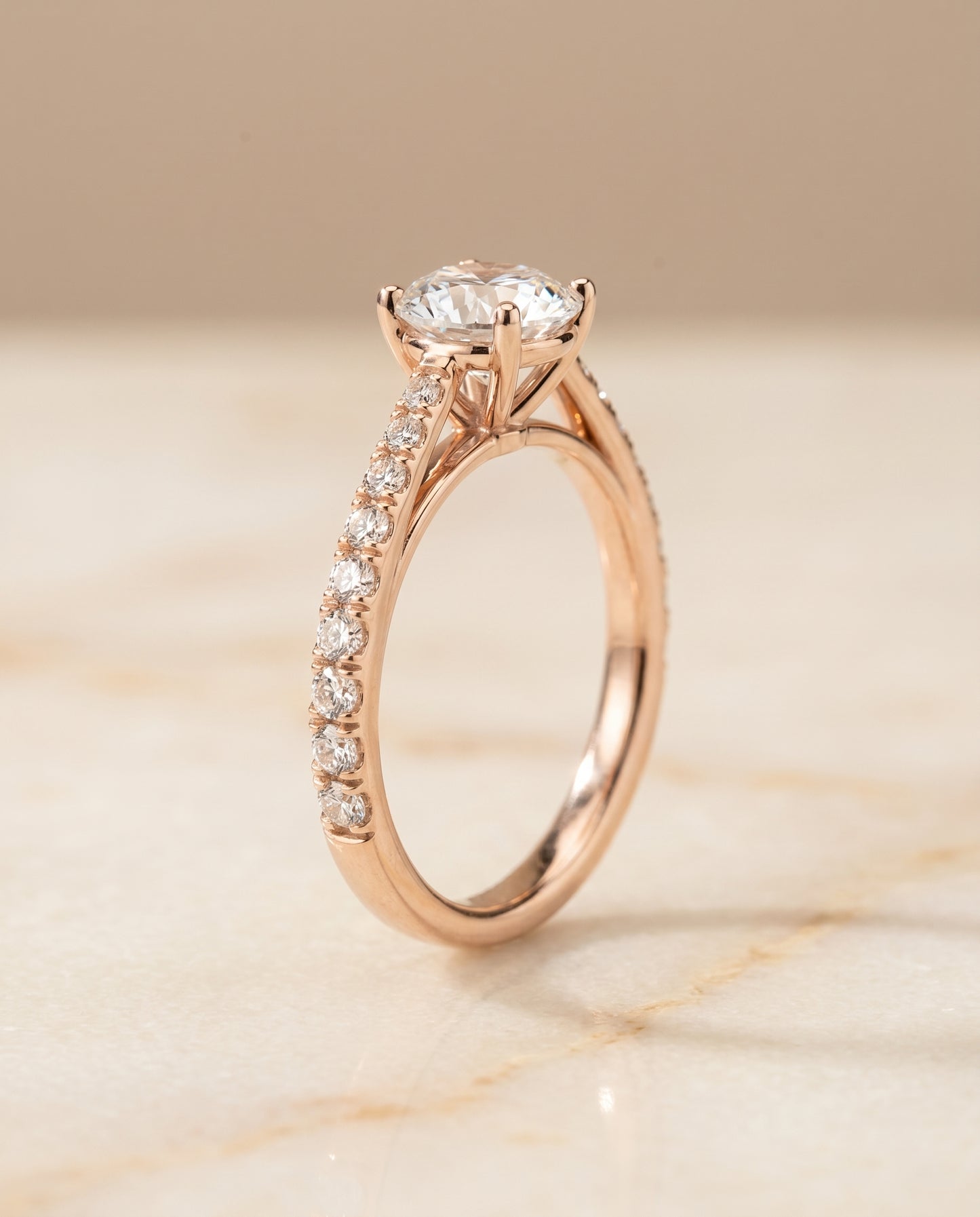 The Donna Cathedral French Pavé Solitaire Round Engagement Ring Setting in 14K Rose Gold