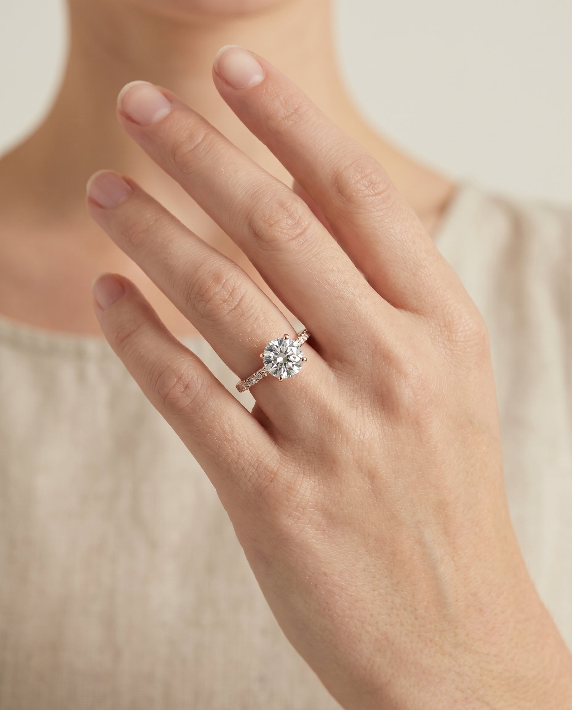 The Donna engagement ring setting in 14K Rose Gold, cathedral french pavé solitaire design | RockHer