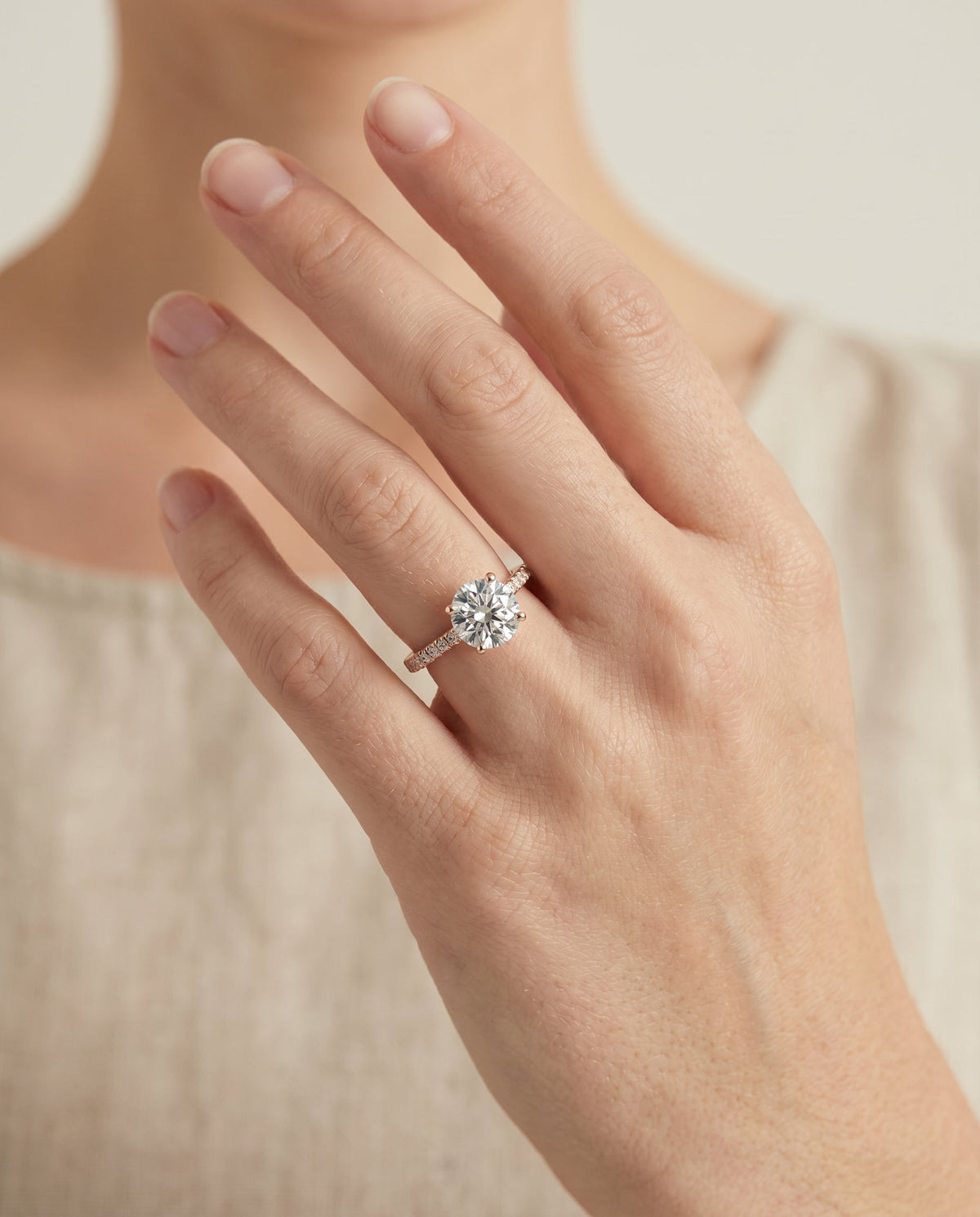 Donna Select Cathedral Round Lab Diamond Engagement Ring in 14K Rose Gold, shown on hand | RockHer