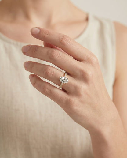 Donna Select Cathedral French Pavé Solitaire Oval Lab Diamond Engagement Ring in 14K Yellow Gold, shown on hand | RockHer